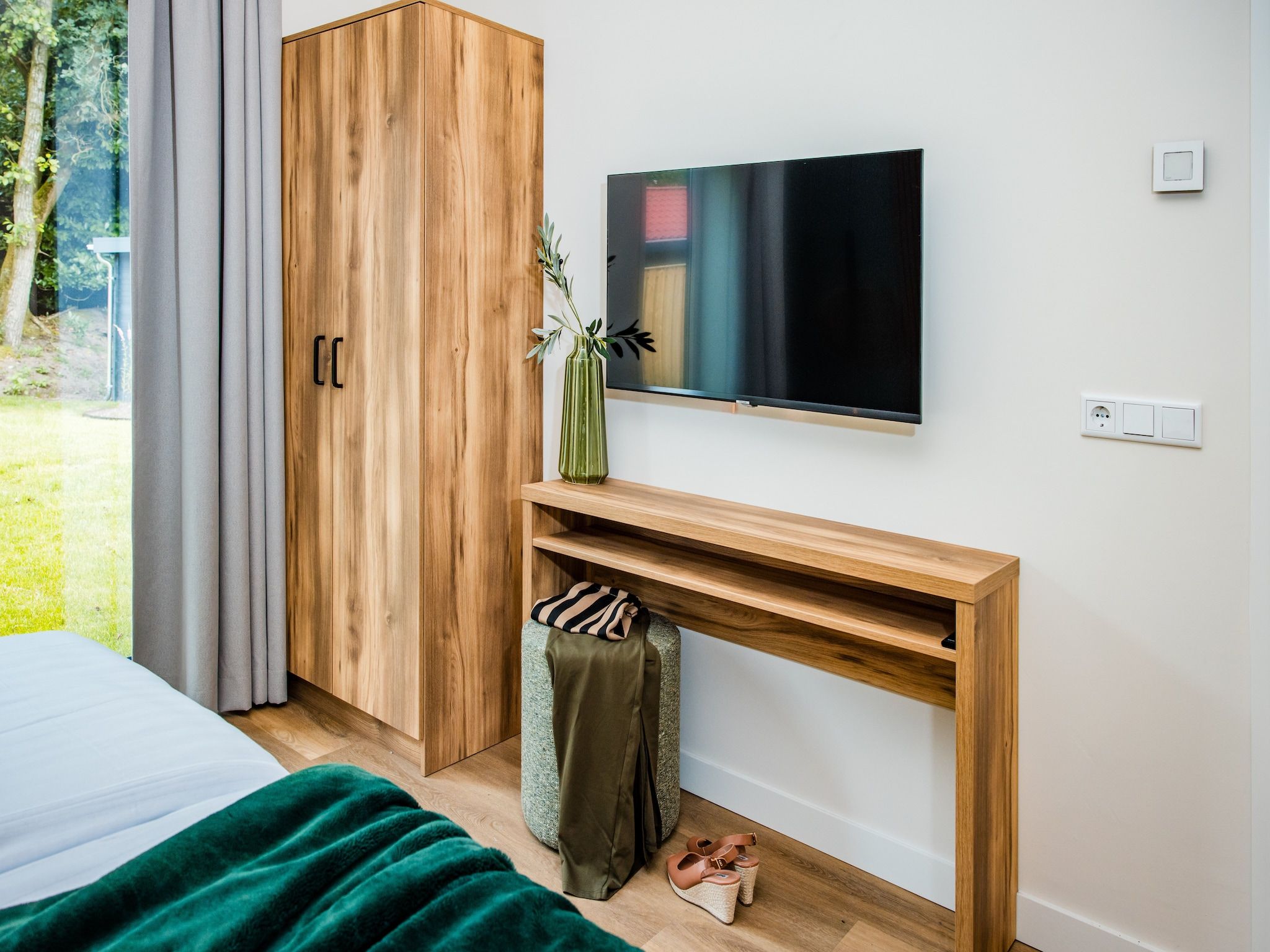Een slaapkamer van Dwergarend 17-19 in Voorthuizen