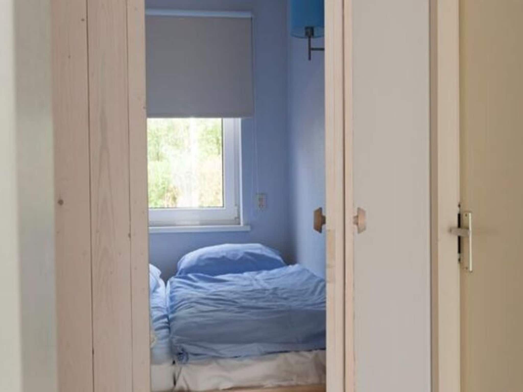 Een slaapkamer van Grand Tolve Wellness de luxe met sauna buitenspa in Earnewald