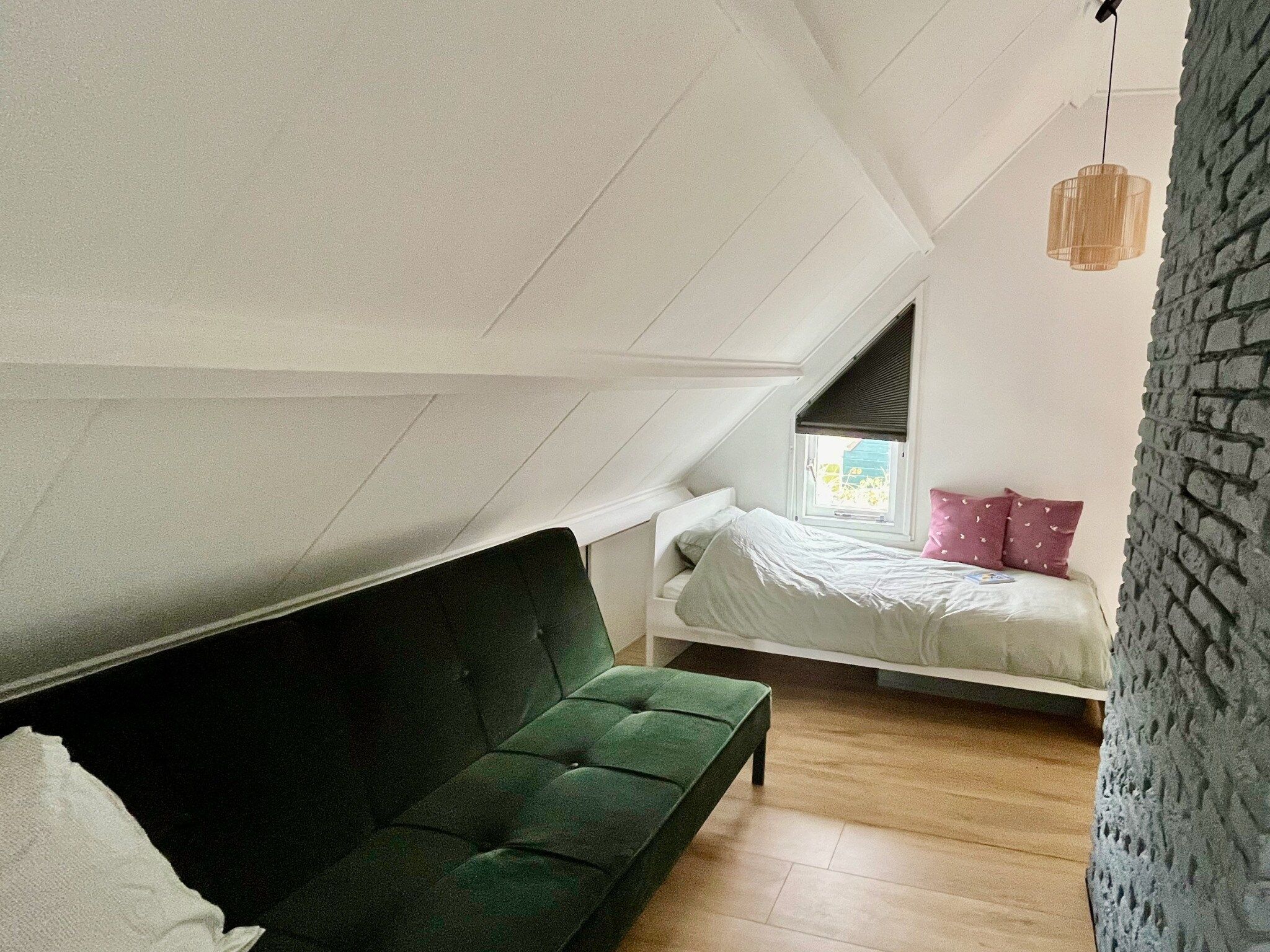 Een slaapkamer van Familiehuis in Noordwijkerhout in Noordwijkerhout