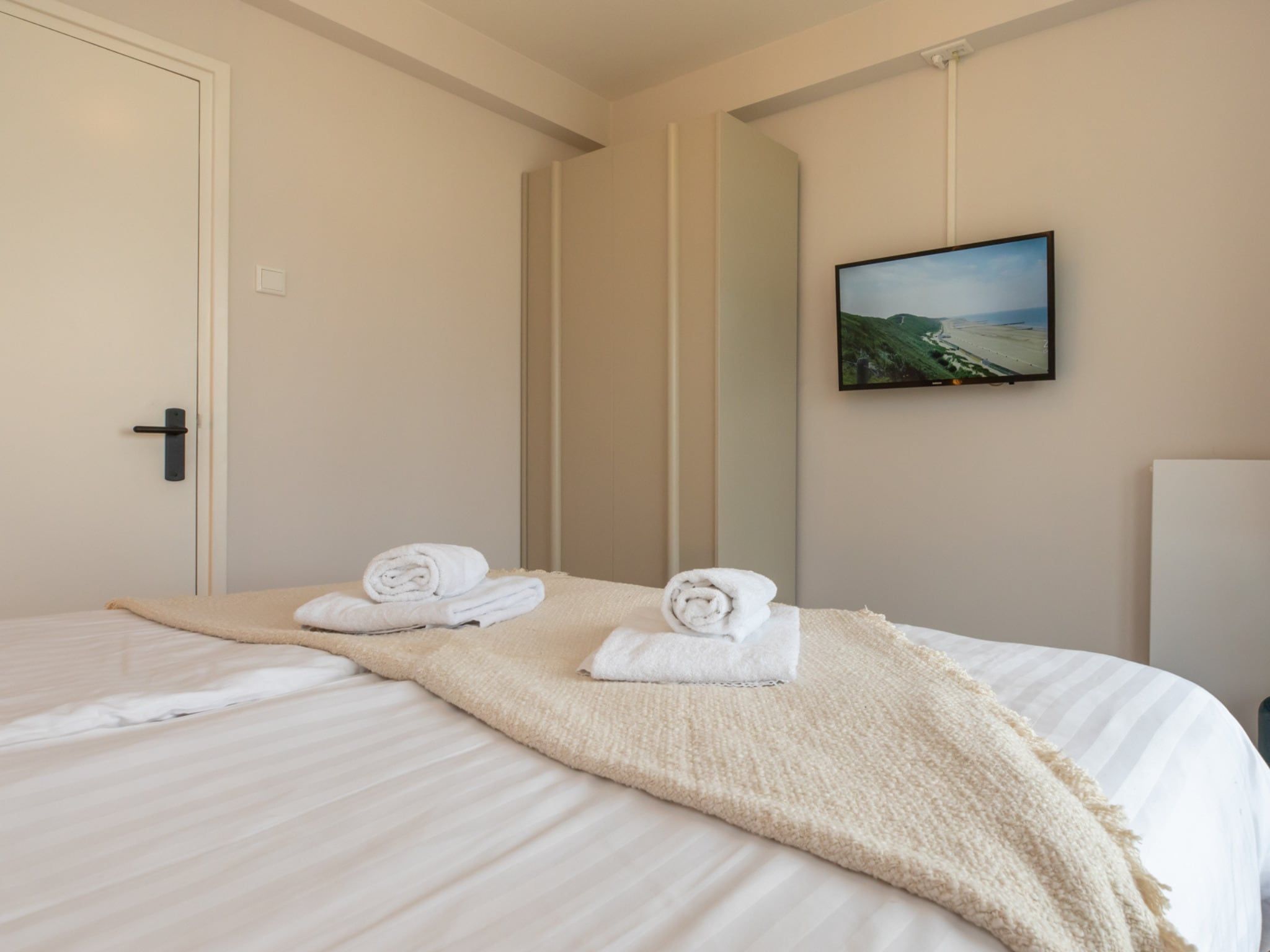 Een slaapkamer van Nieuwstraat 1  Zoutelande 'Kurhaus - 2 in Zoutelande