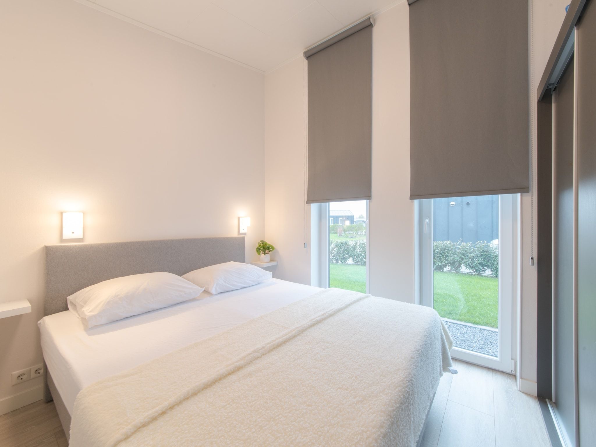 Een slaapkamer van Water Resort Oosterschelde 45 in Wemeldinge