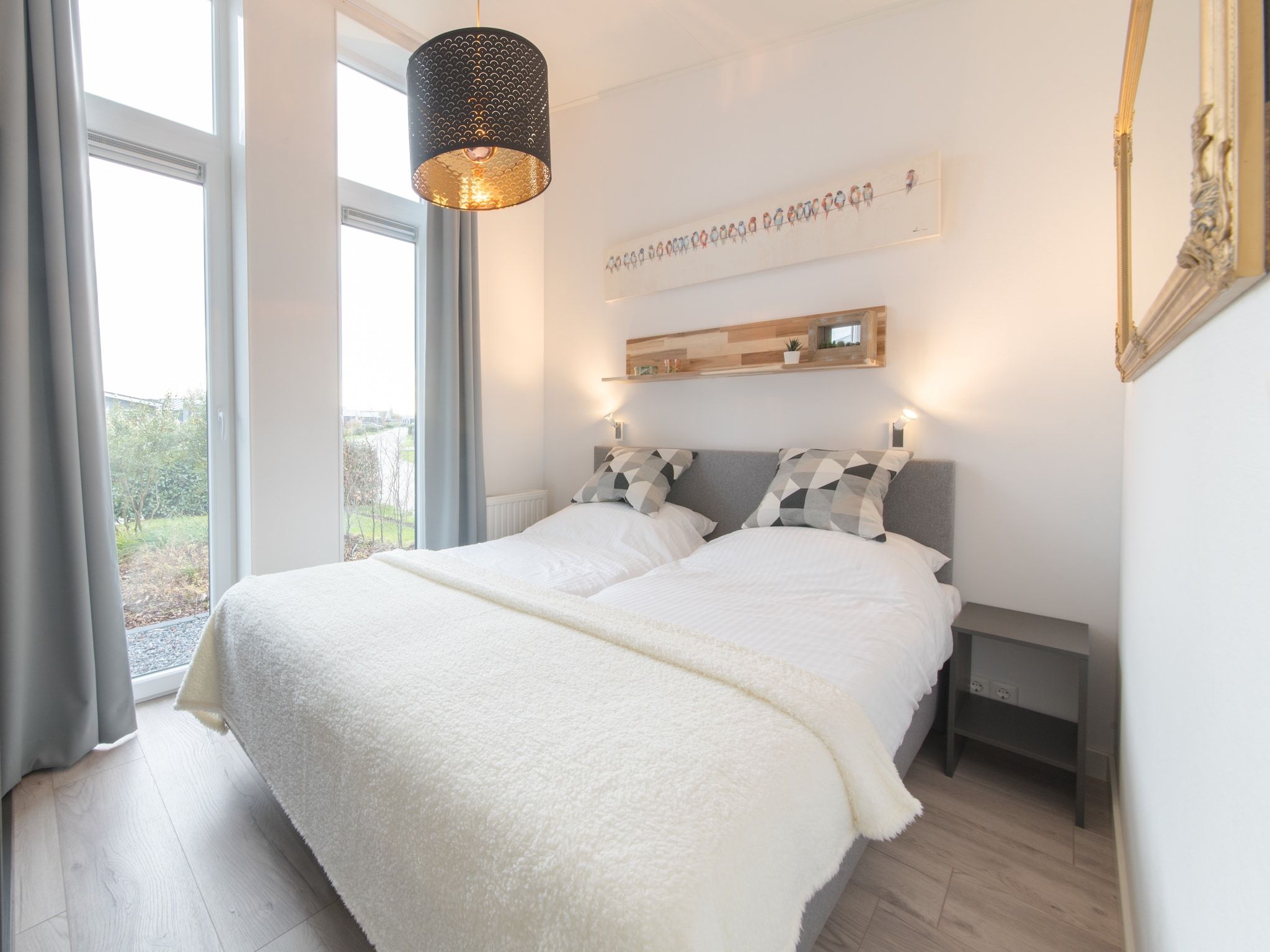 Een slaapkamer van Water Resort Oosterschelde 34 in Wemeldinge
