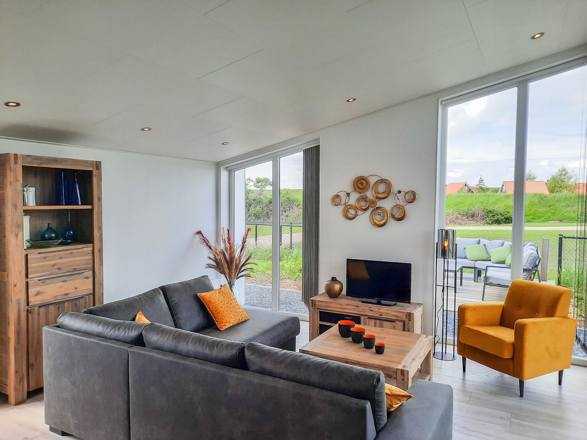 De woonkamer van Water Resort Oosterschelde 83 in Wemeldinge