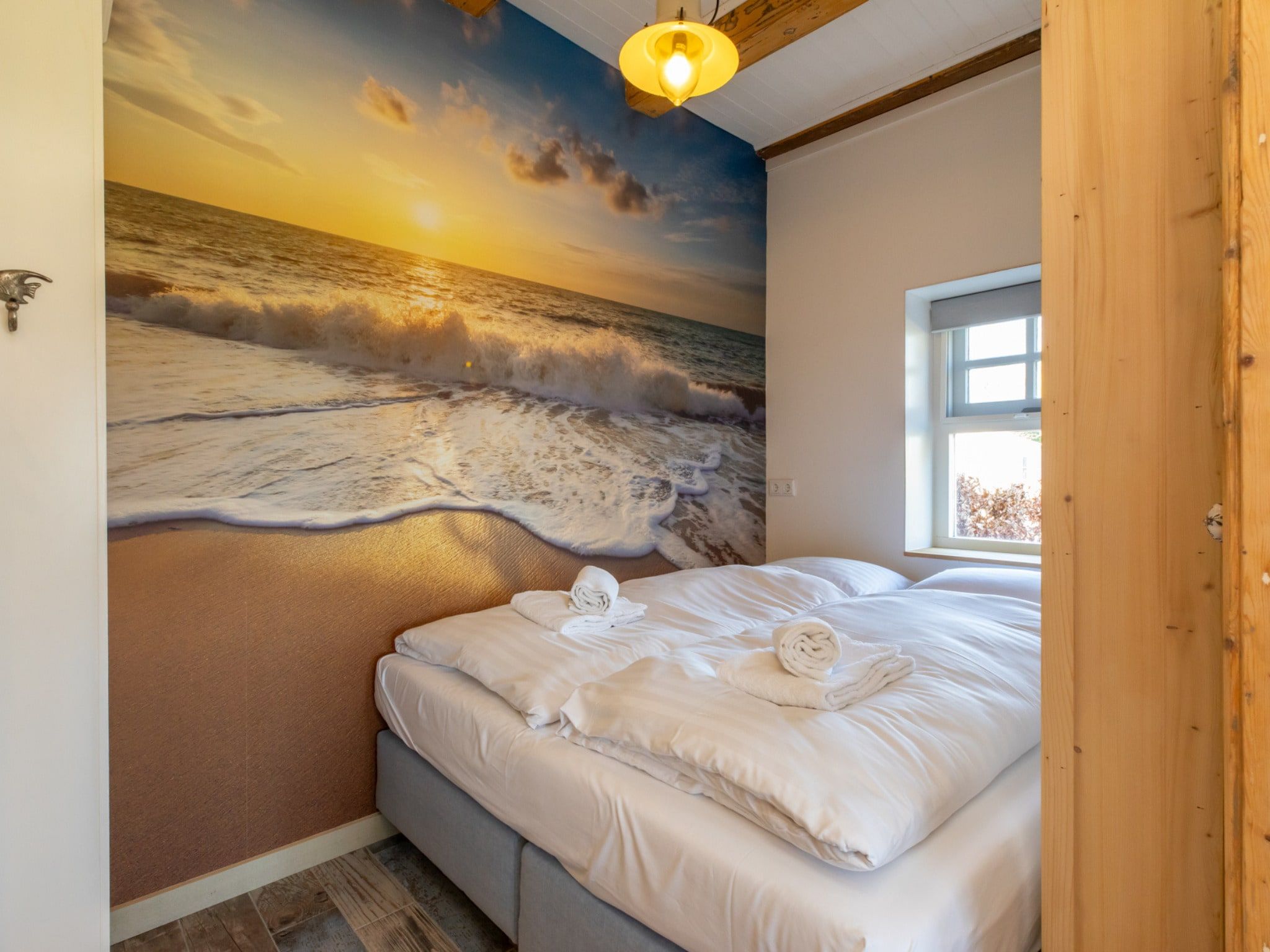Een slaapkamer van Verkorte Groeneweg 2 in Koudekerke