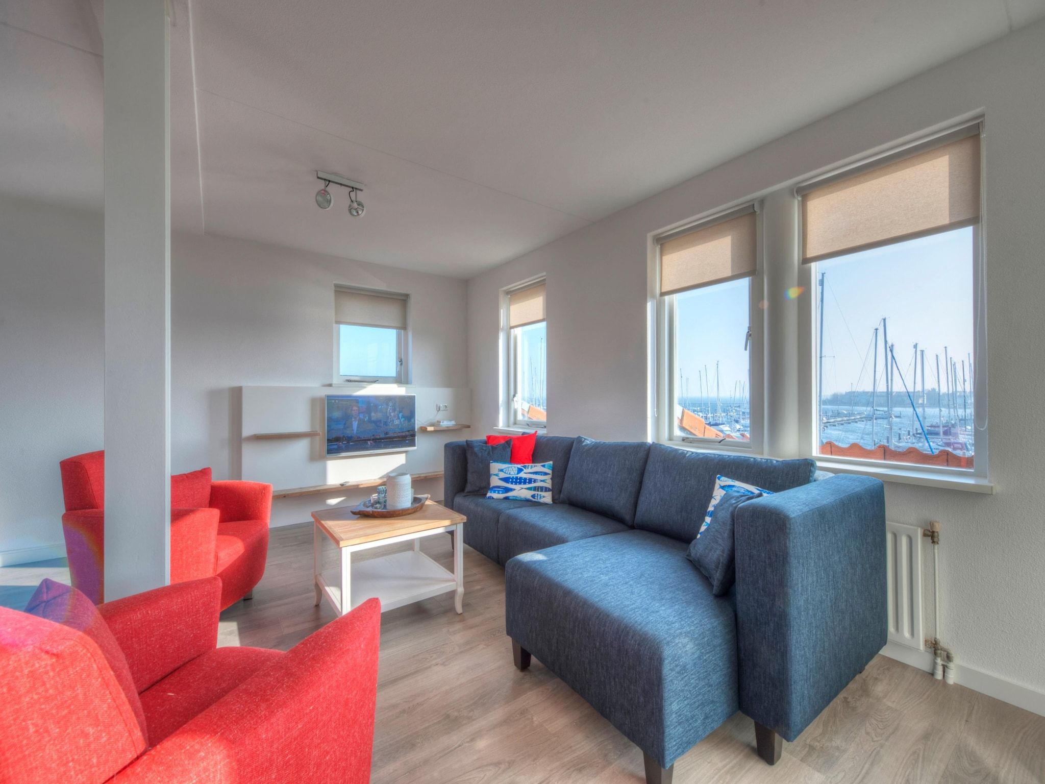 De woonkamer van Marina Port Zélande 2 in Ouddorp