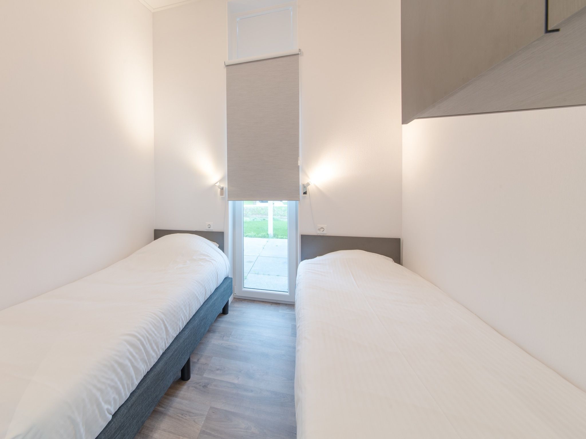 Een slaapkamer van Water Resort Oosterschelde 38 in Wemeldinge