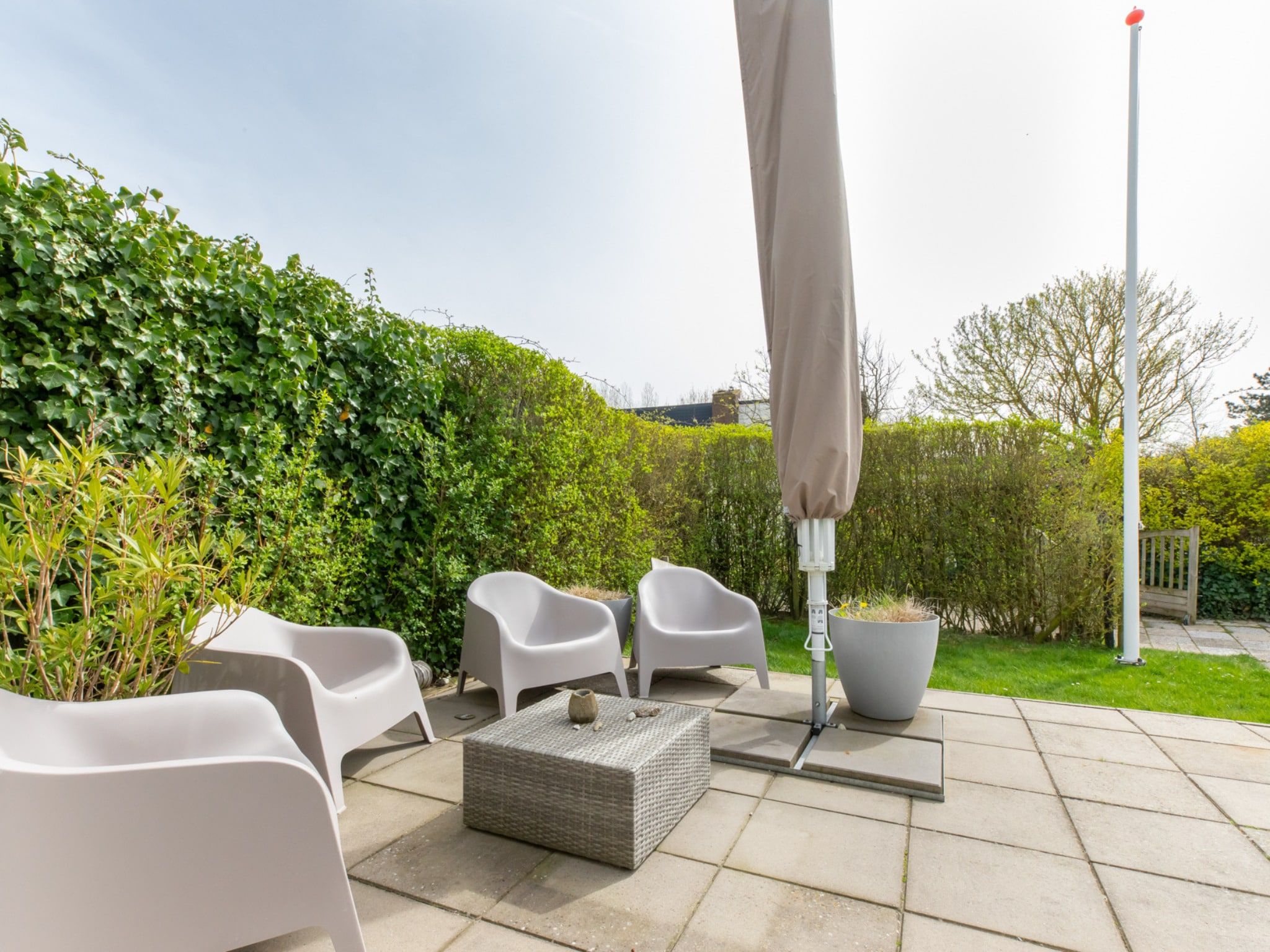 De tuin van Vakantiehuis - Lepelblad 97 in Nieuwvliet