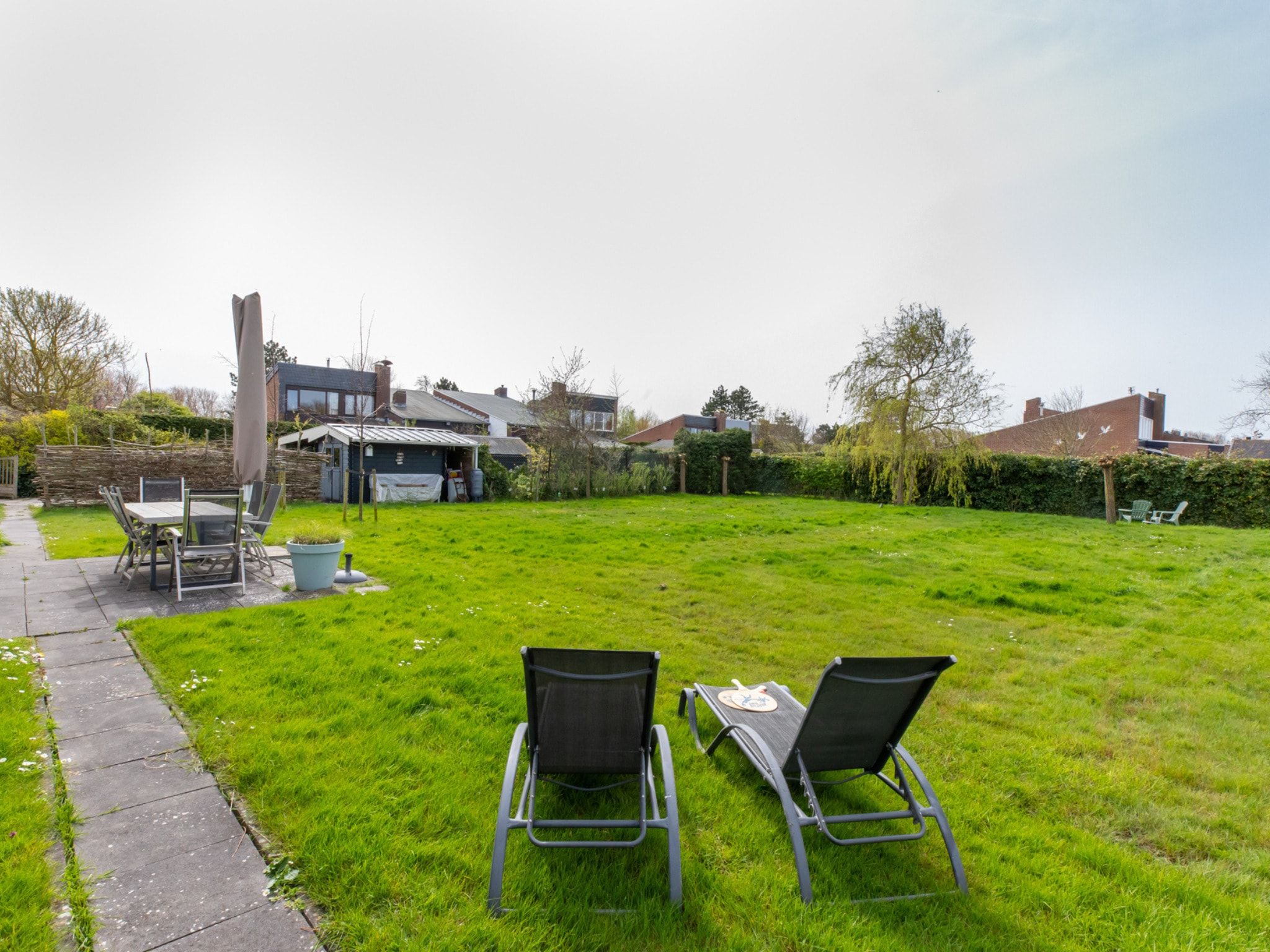 De tuin van Vakantiehuis - Lepelblad 97 in Nieuwvliet