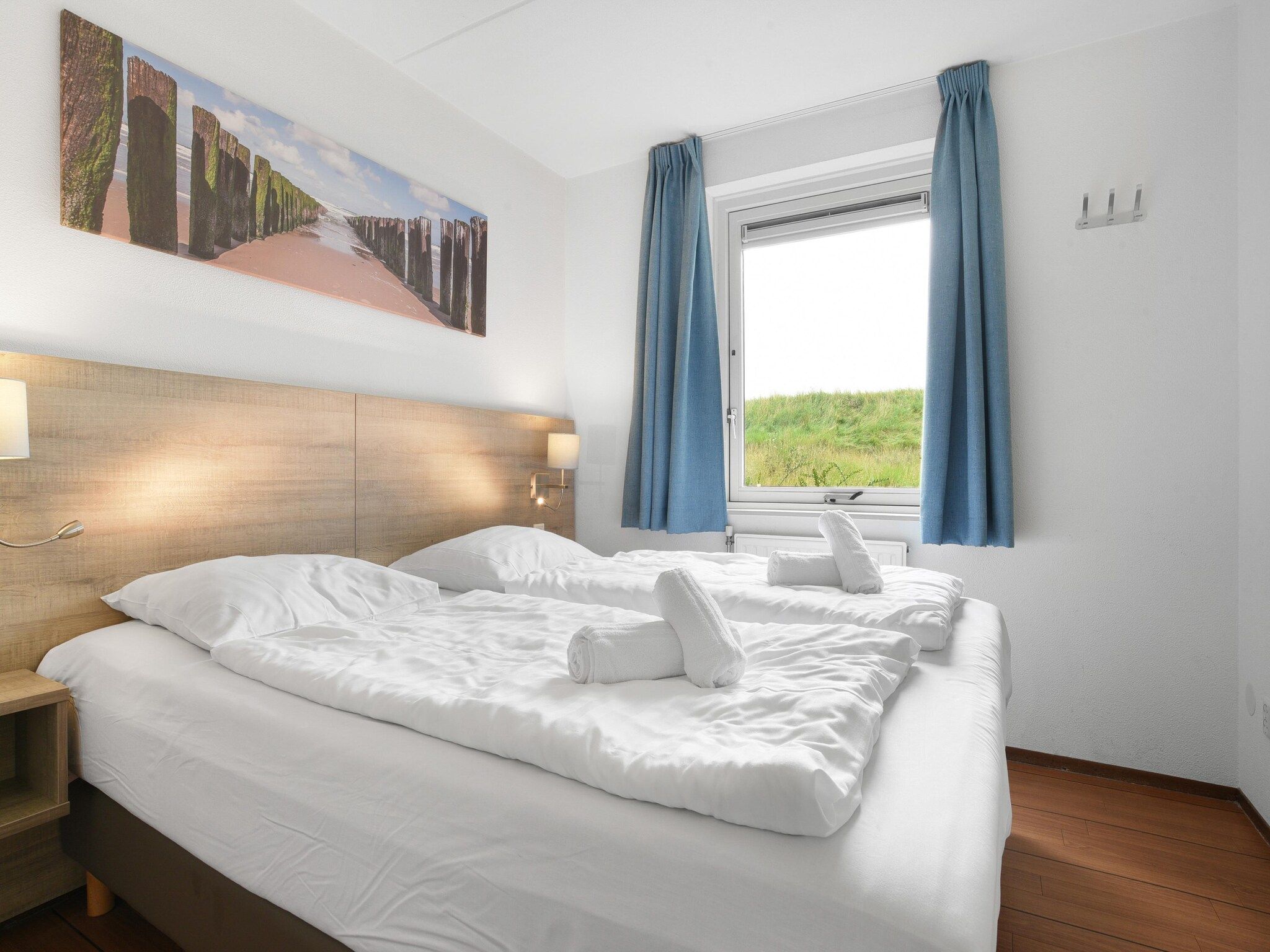 Een slaapkamer van Parc Port Greve 9 in Brouwershaven