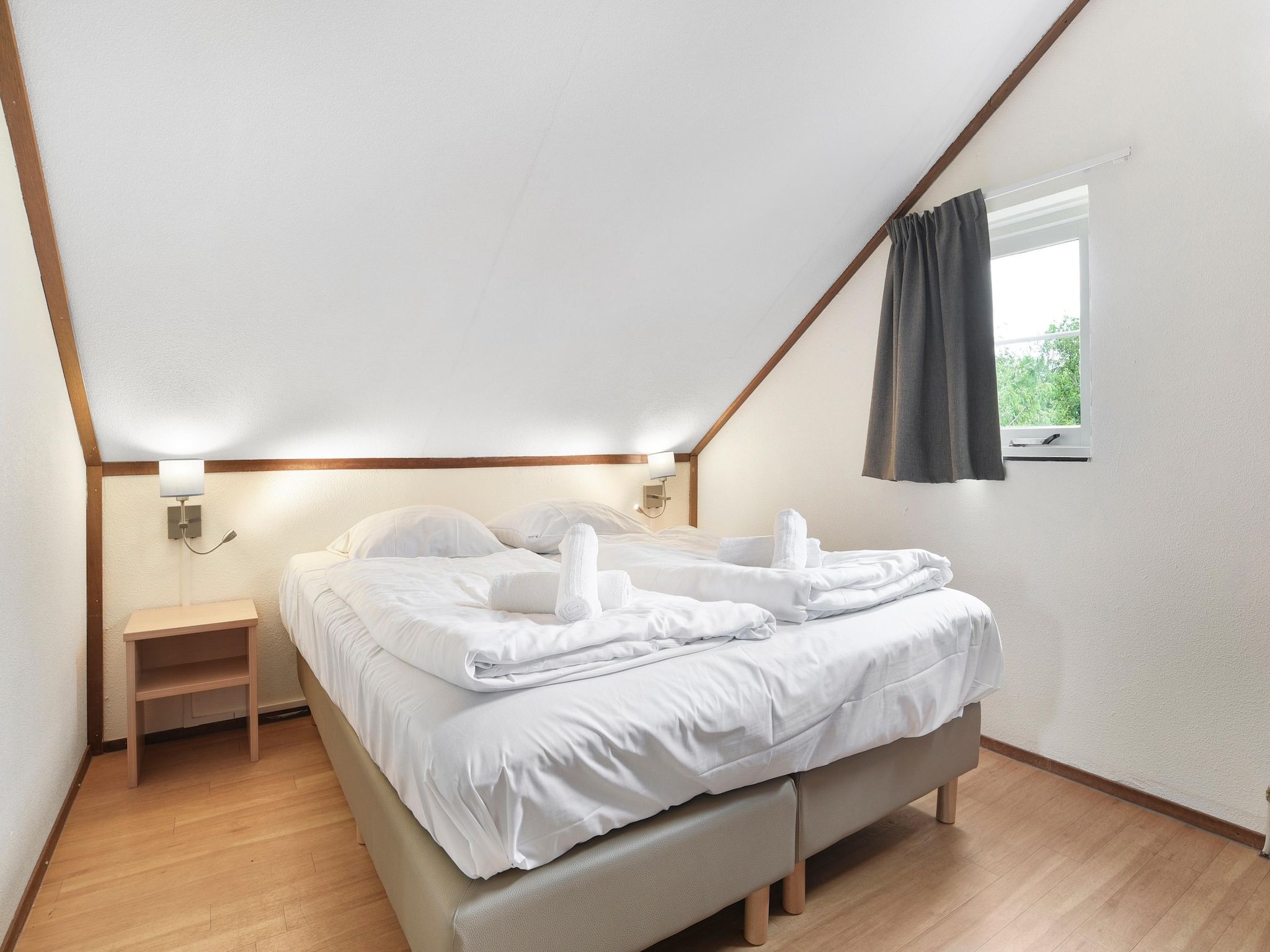 Een slaapkamer van Parc Port Greve 12 in Brouwershaven