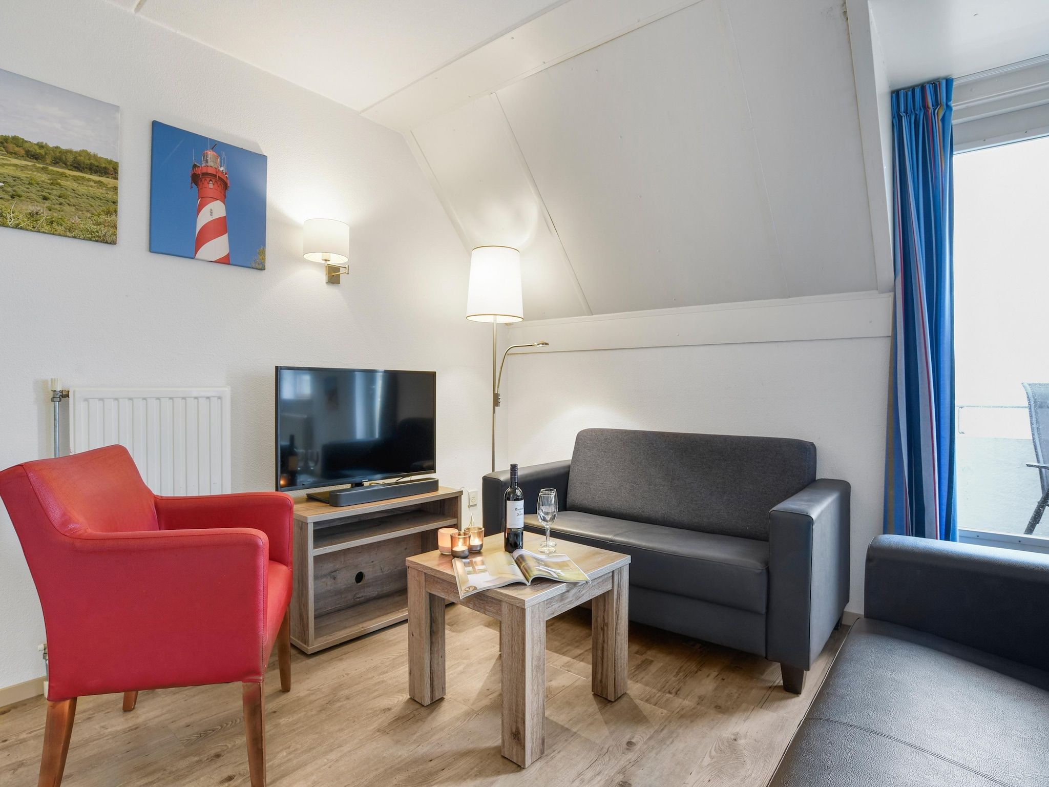 De woonkamer van Parc Port Greve 15 in Brouwershaven