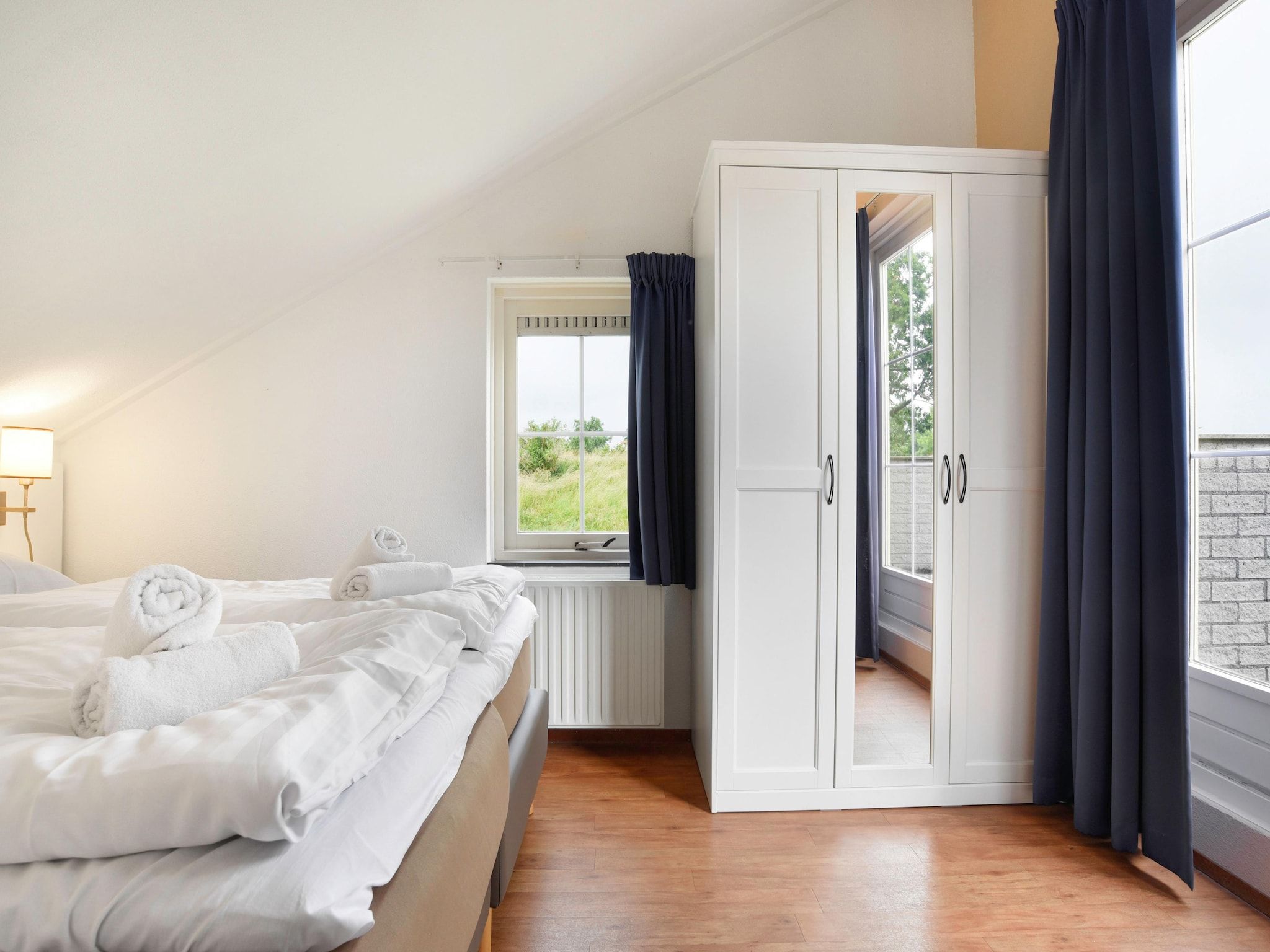 Een slaapkamer van Parc Port Greve 16 in Brouwershaven