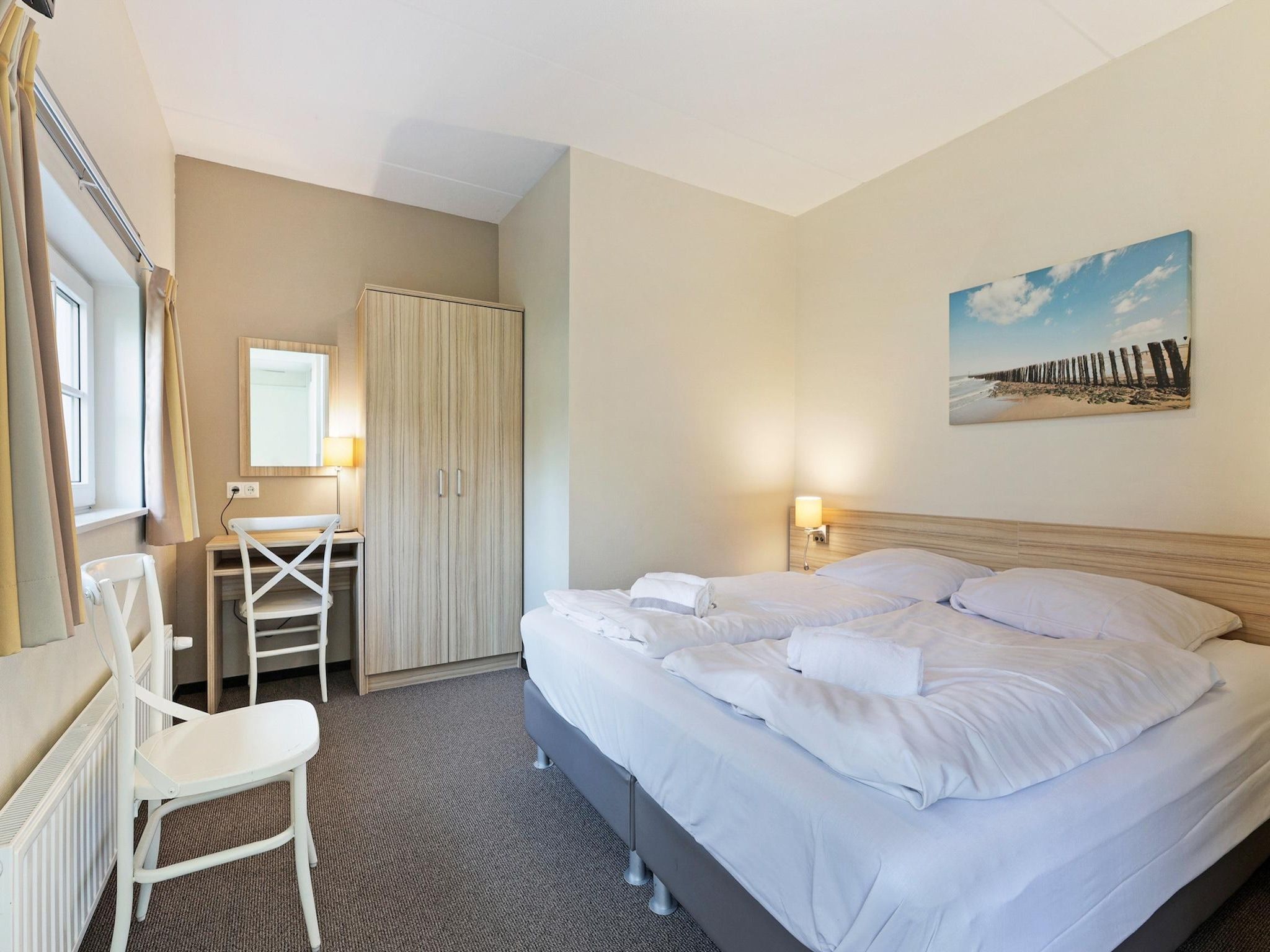 Een slaapkamer van Strand Resort Nieuwvliet-Bad 3 in Nieuwvliet