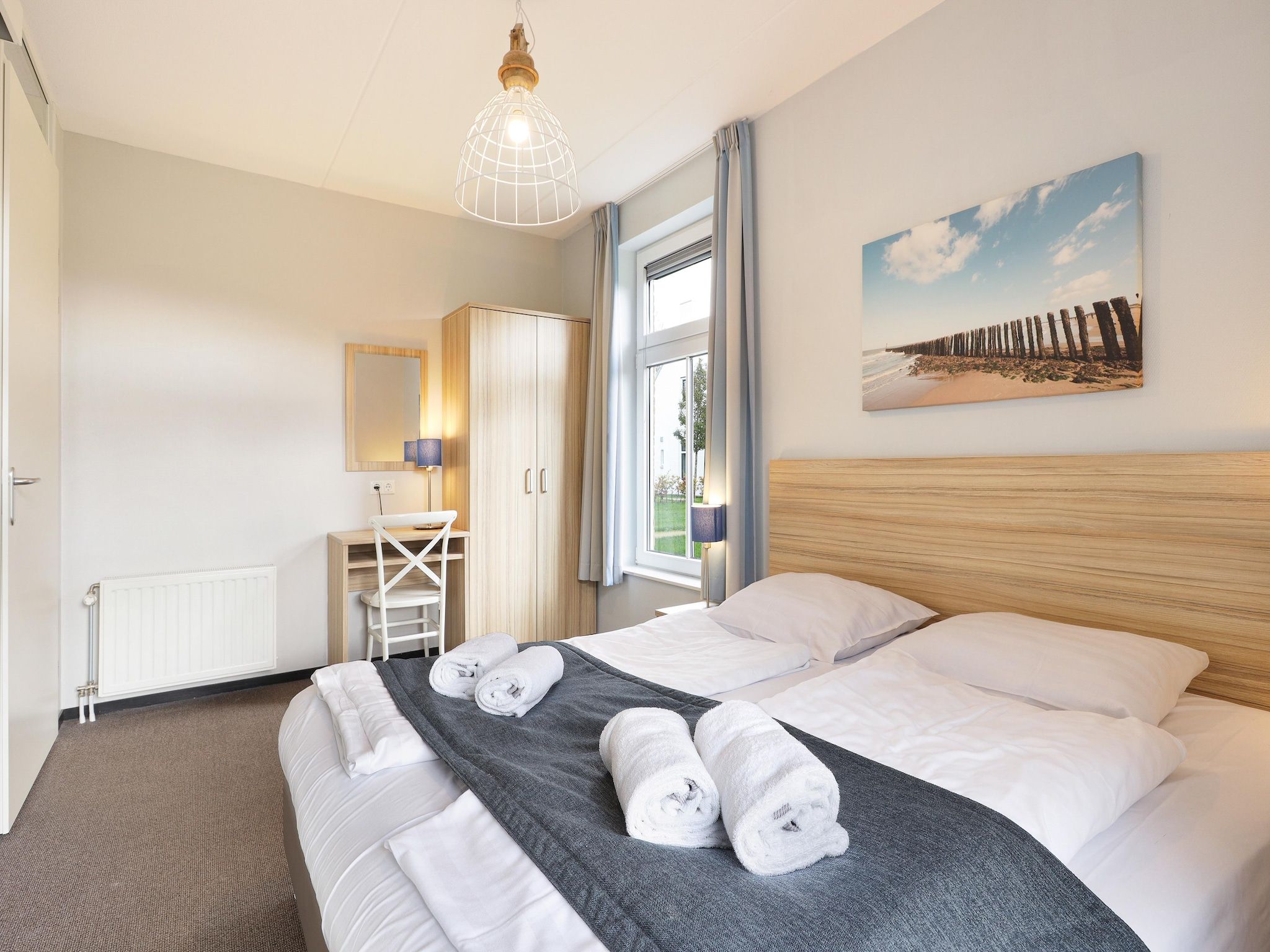 Een slaapkamer van Strand Resort Nieuwvliet-Bad 10 in Nieuwvliet