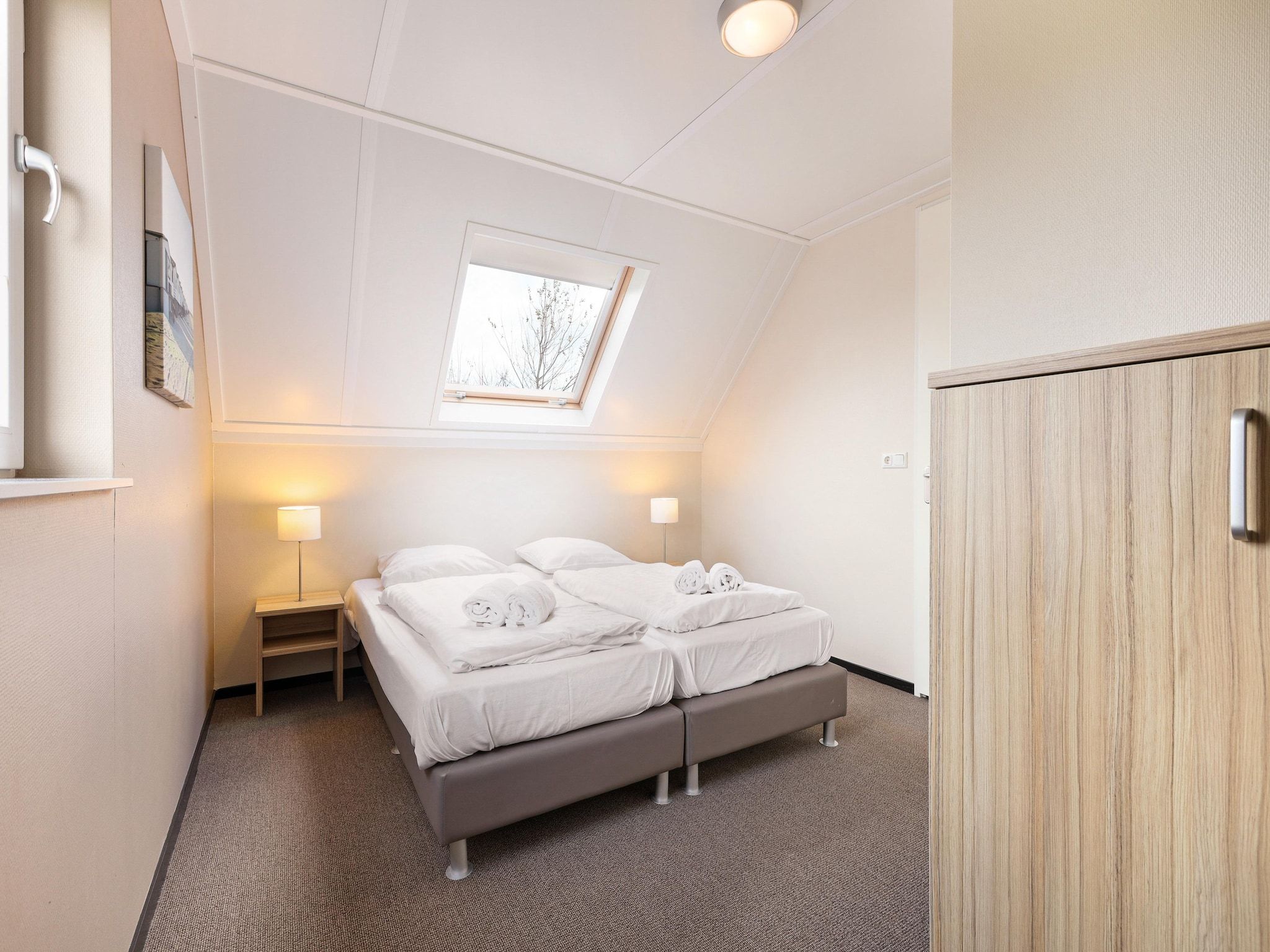Een slaapkamer van Strand Resort Nieuwvliet-Bad 11 in Nieuwvliet