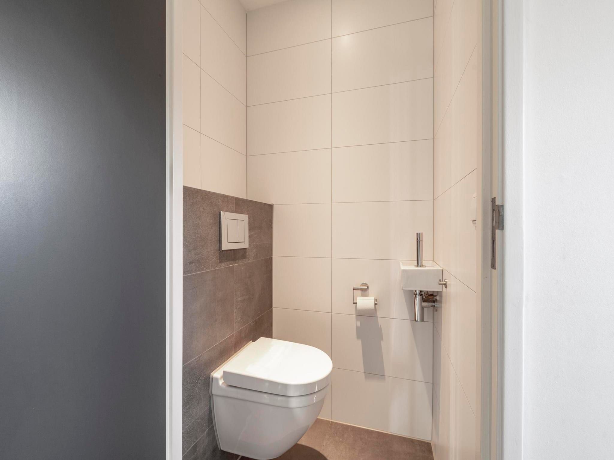 De badkamer van Bungalow Uitwaayer in Sint Maartensvlotbrug