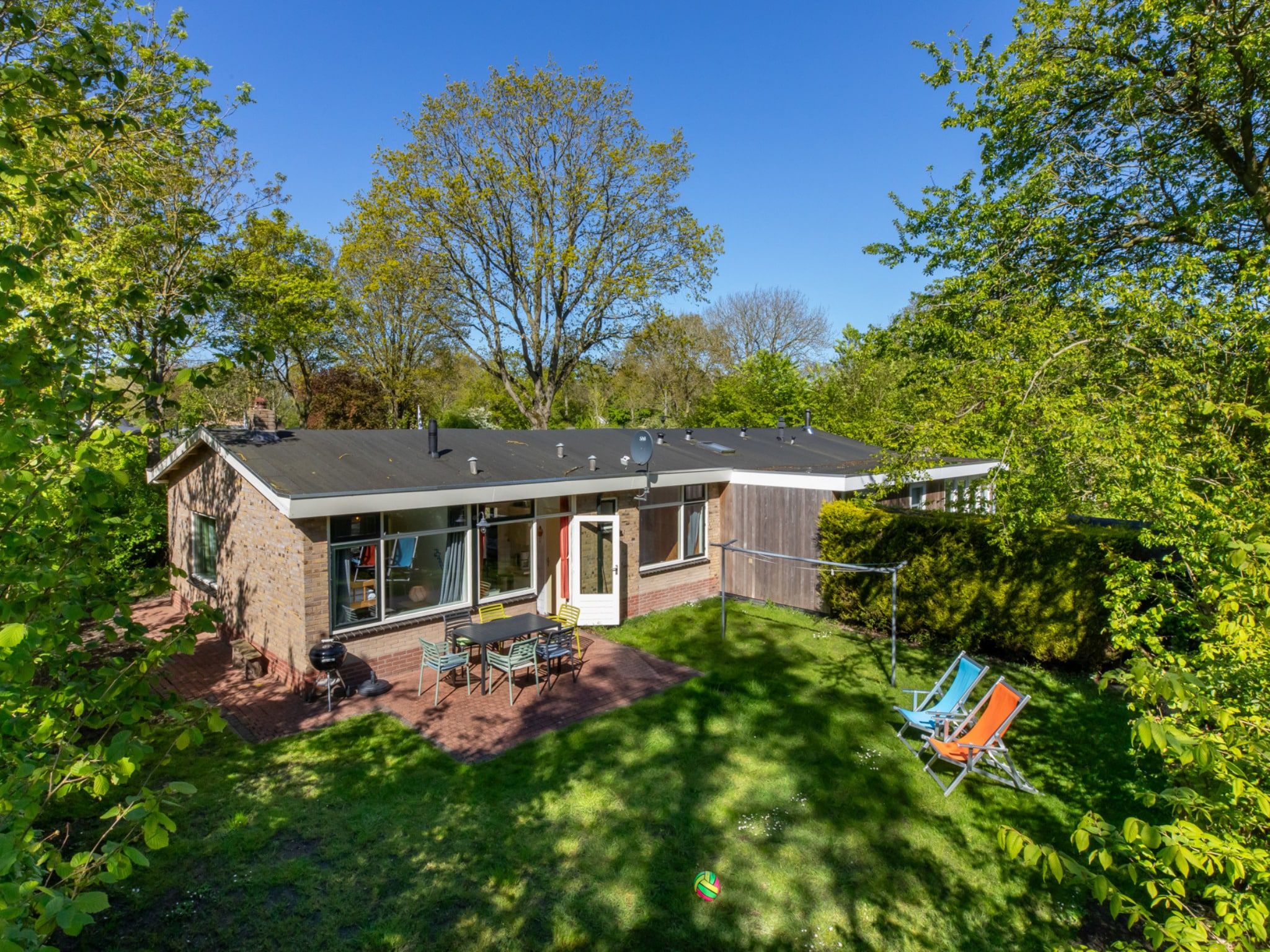 De tuin van Vakantiehuis - Oosterpark 77 - Oostkapelle in Oostkapelle