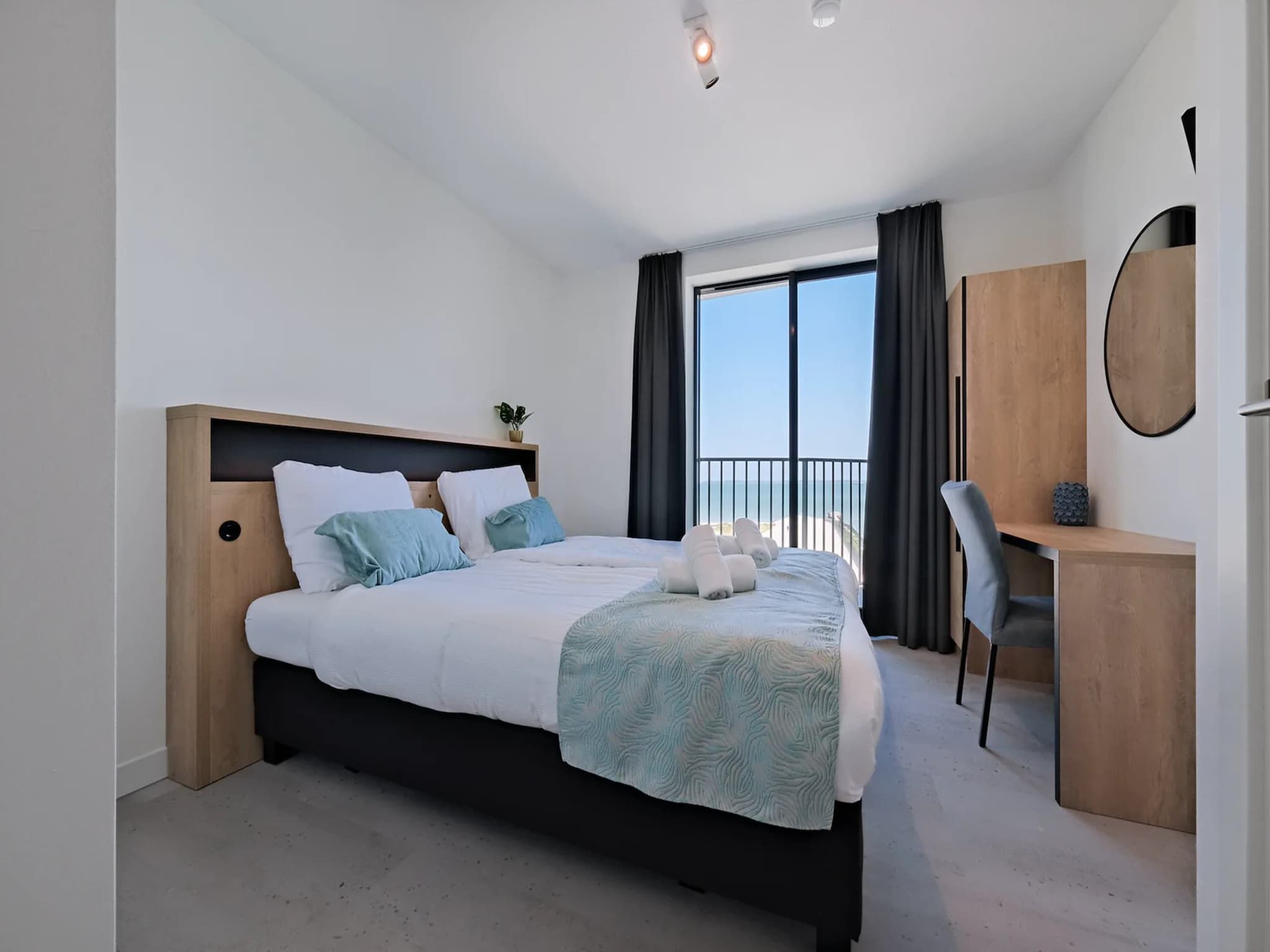 Een slaapkamer van Breskens Apartments & Penthouses 10 in Breskens