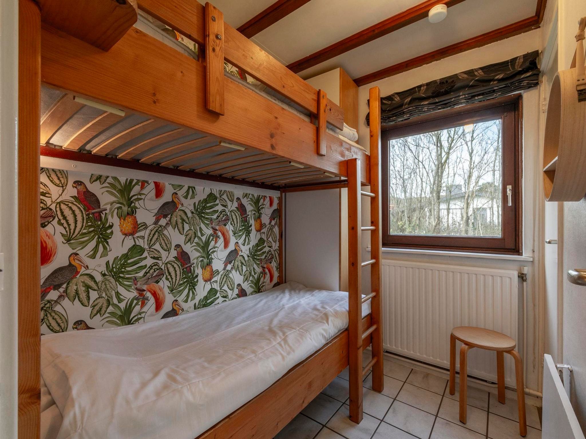 Een slaapkamer van Orchis 4 in Julianadorp aan Zee