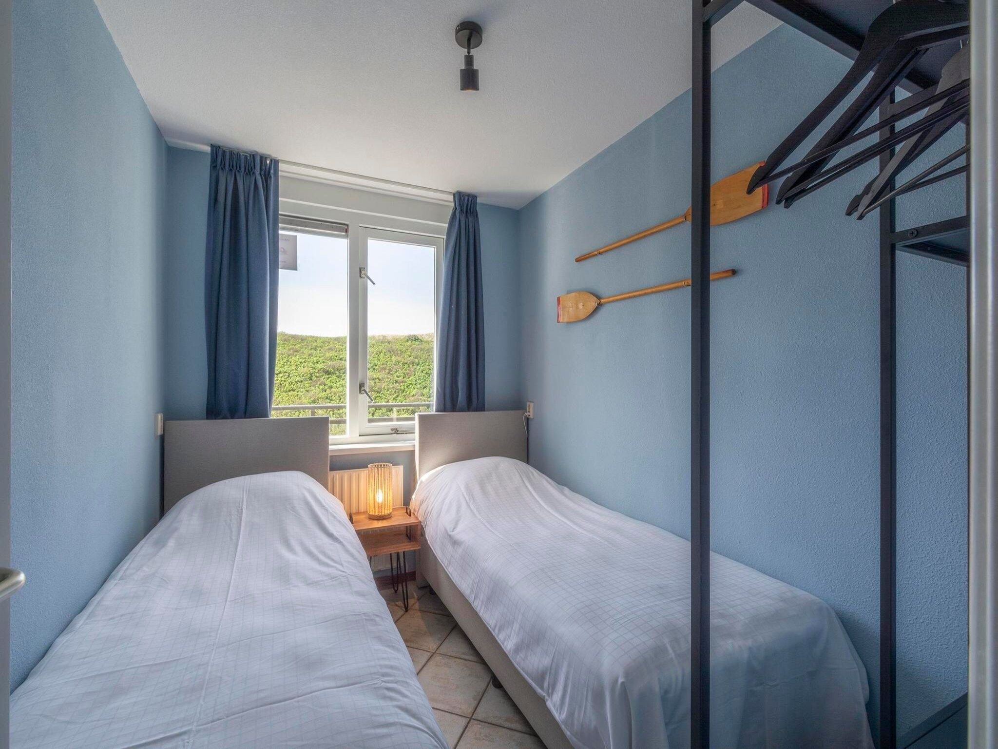 Een slaapkamer van Wijde Blick 310 in Callantsoog