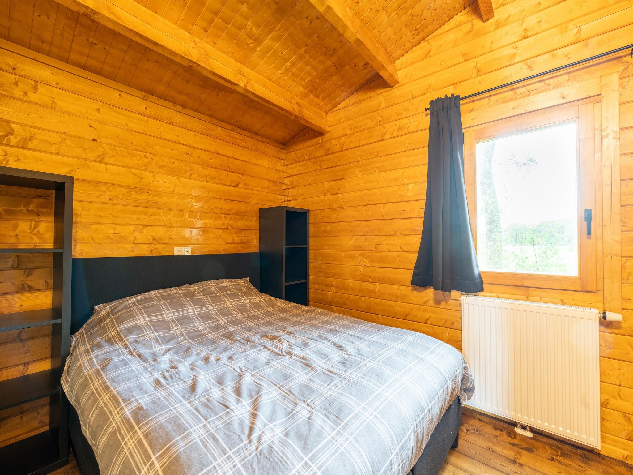 Een slaapkamer van Chalet Riga in Valkenswaard