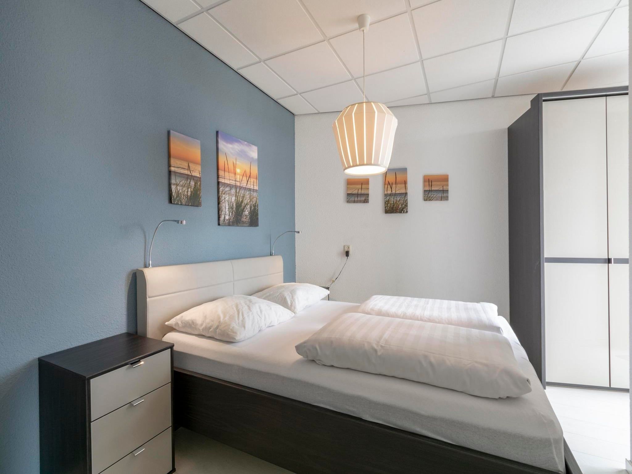Een slaapkamer van Résidence Juliana 54 in Julianadorp aan Zee