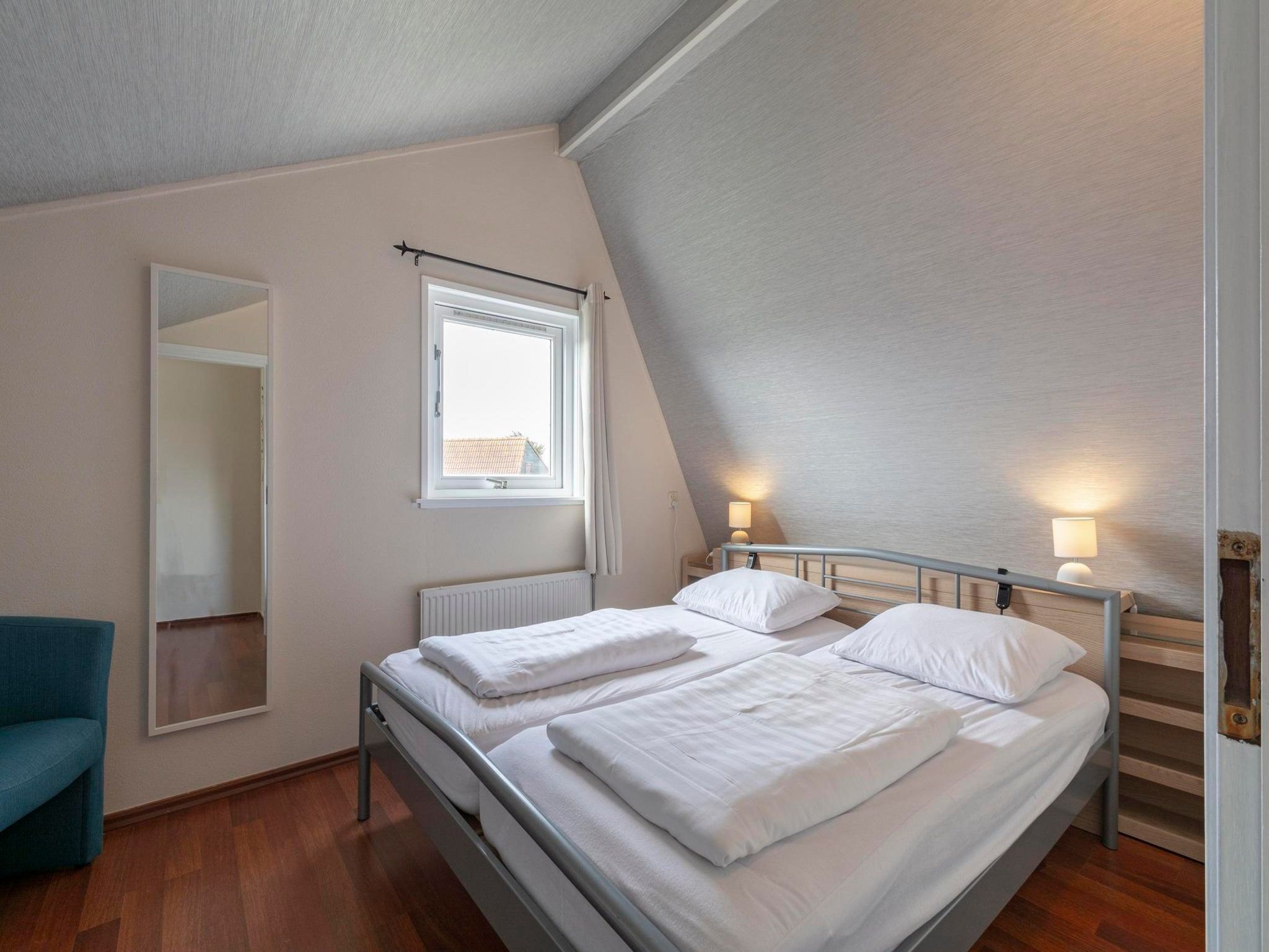 Een slaapkamer van Yperhof 58 in Julianadorp aan Zee