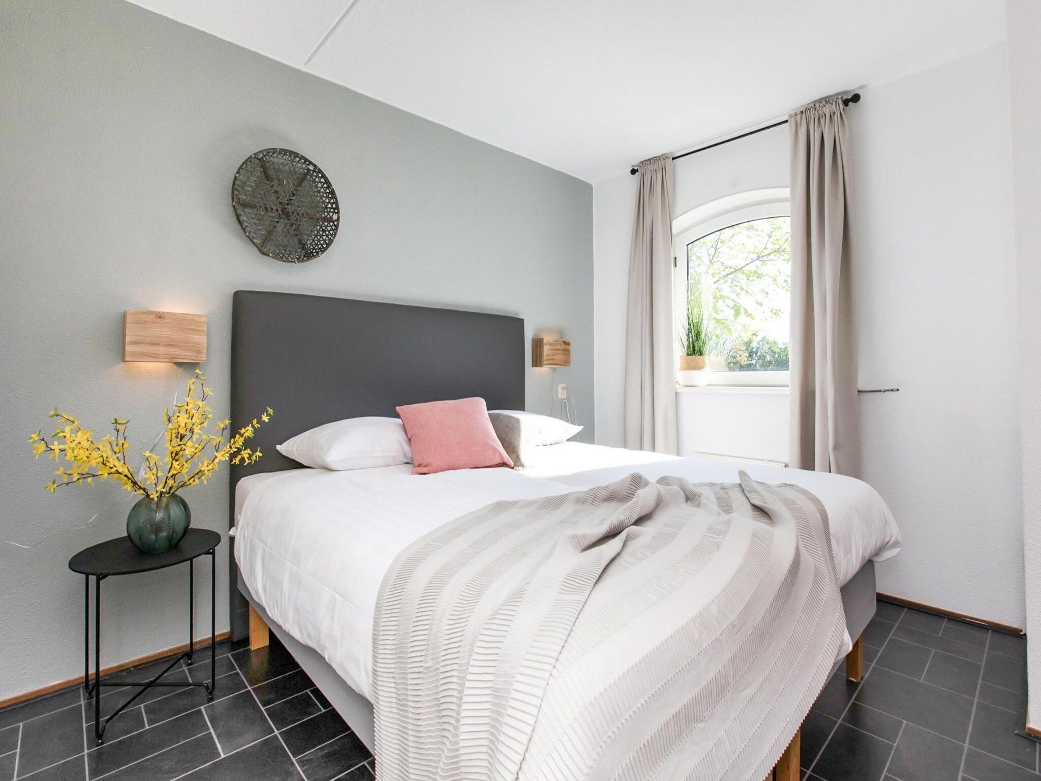Een slaapkamer van Résidence Juliana 56 in Julianadorp aan Zee