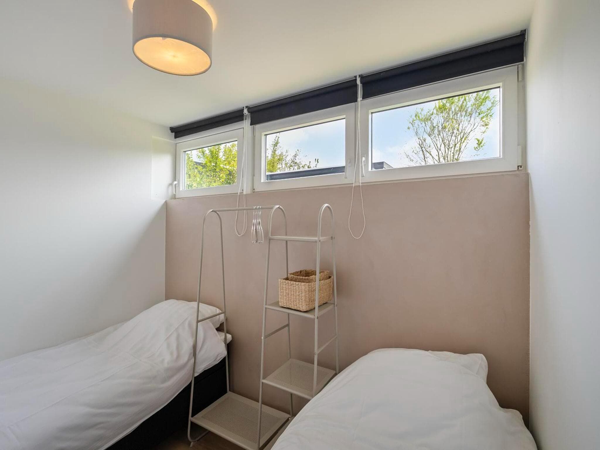 Een slaapkamer van Duinland 15 in Sint Maartenszee