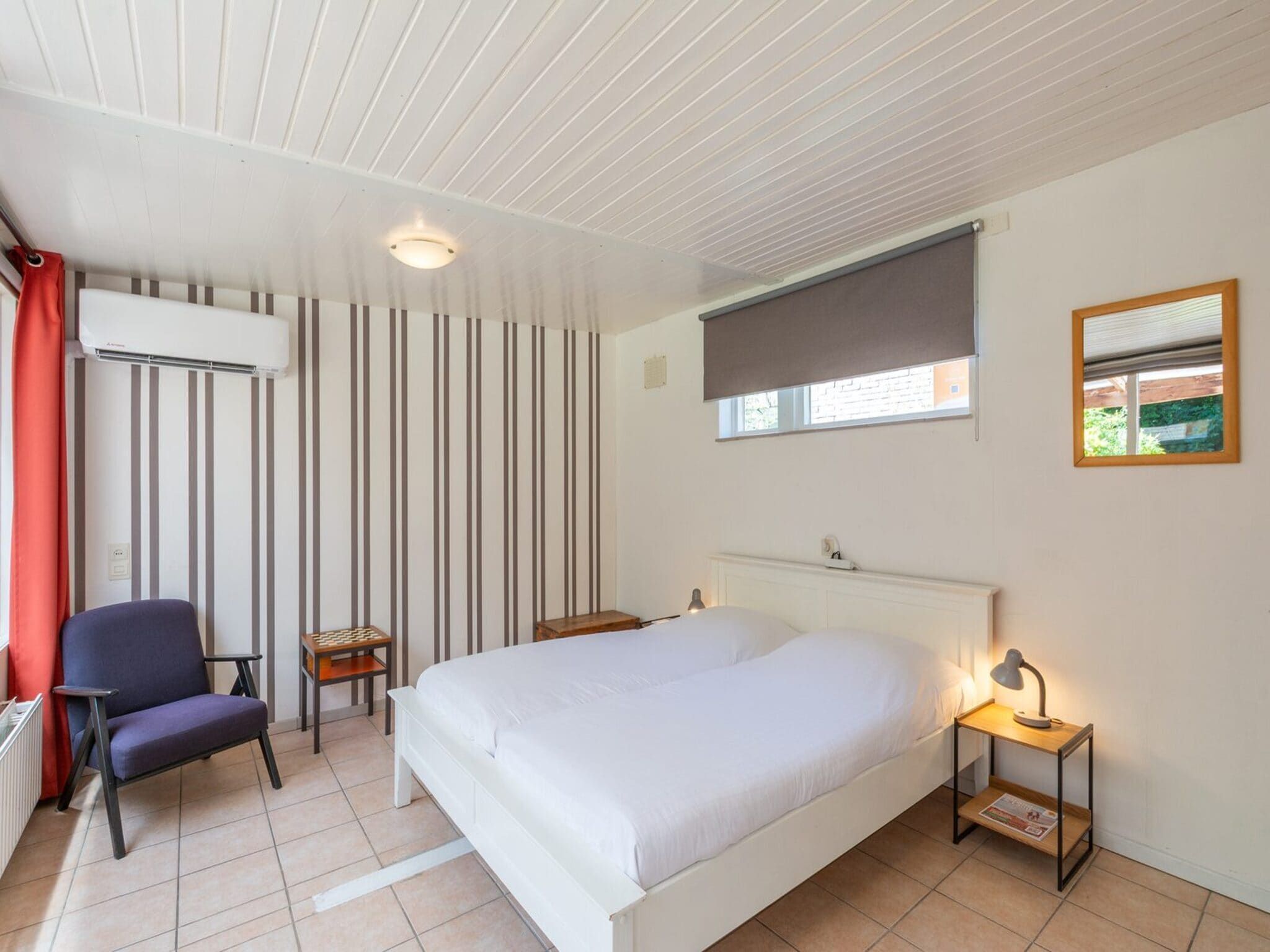 Een slaapkamer van Duinland 186 in Sint Maartenszee