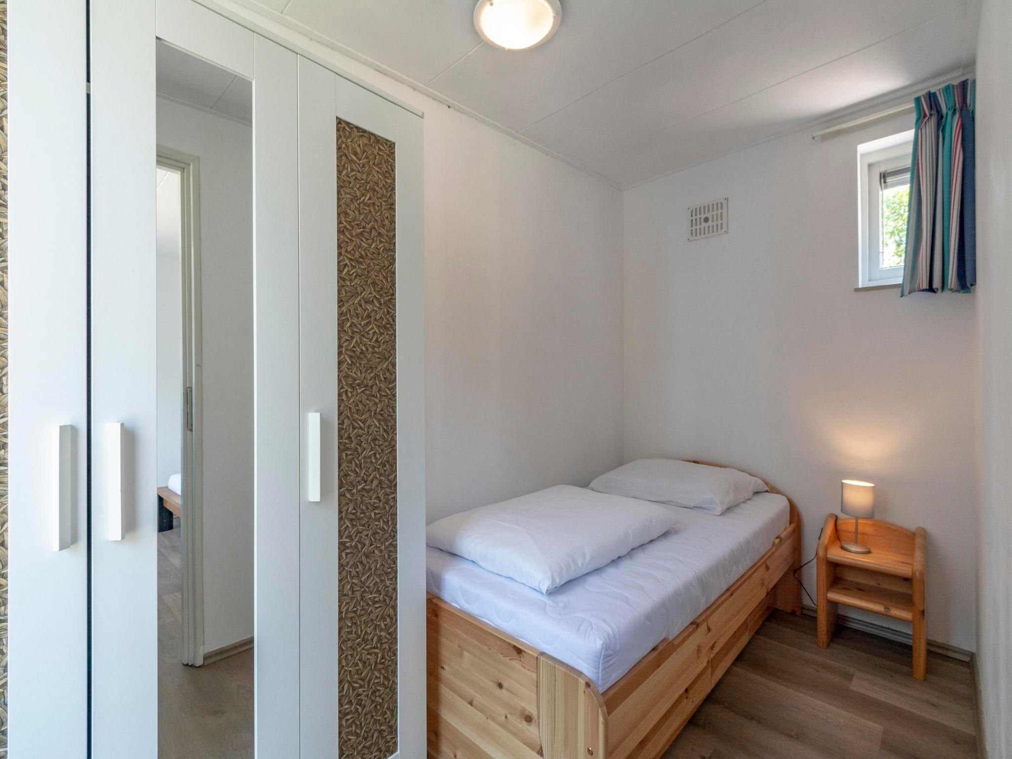 Een slaapkamer van Duinland 190 in Sint Maartenszee