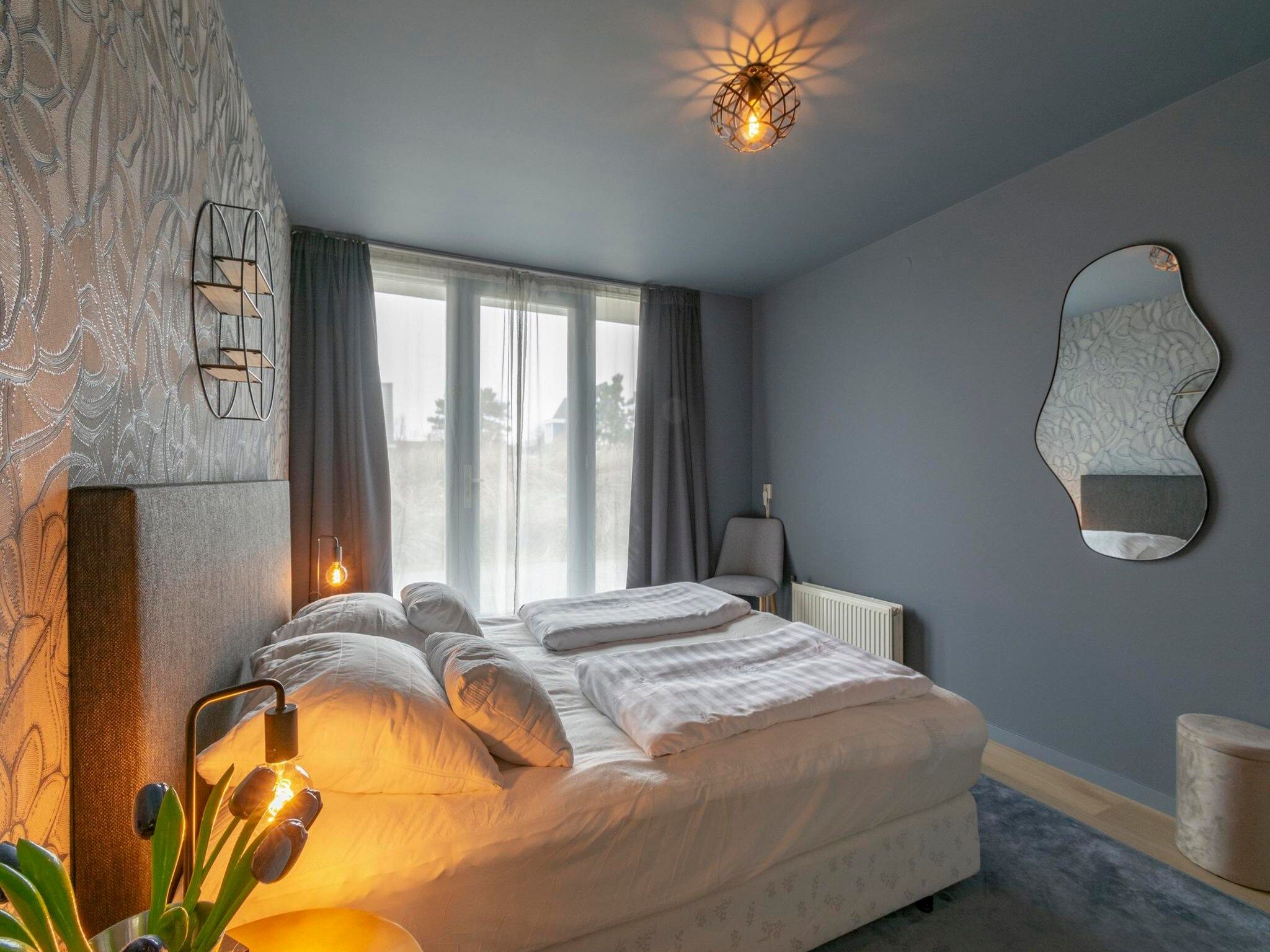 Een slaapkamer van Strandleven 006 in Groote Keeten