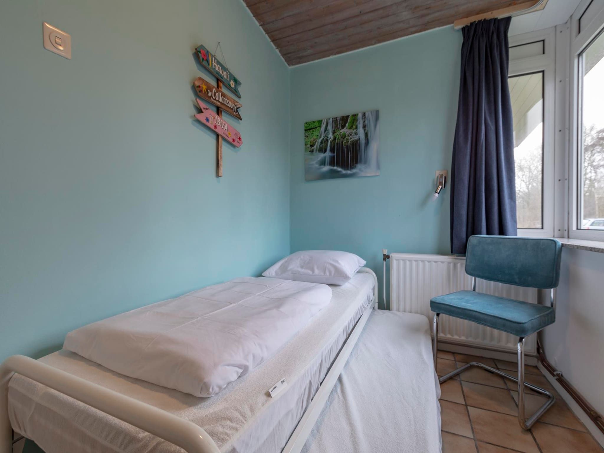 Een slaapkamer van Duinland 89 in Sint Maartenszee