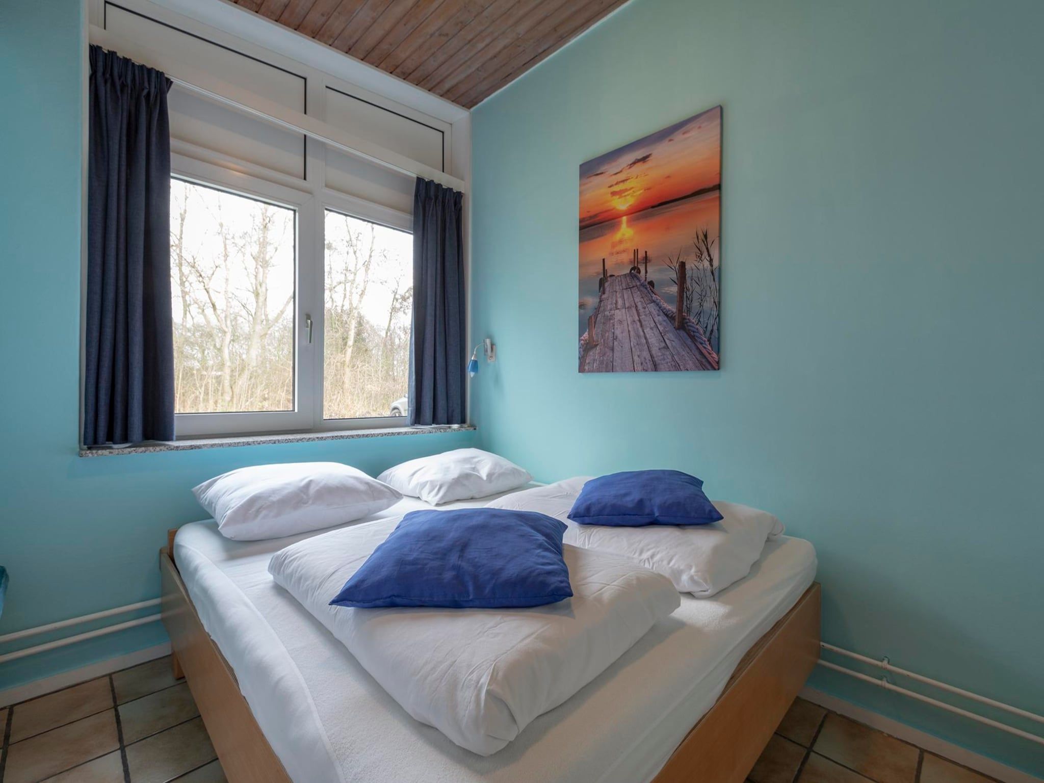 Een slaapkamer van Duinland XL in Sint Maartenszee