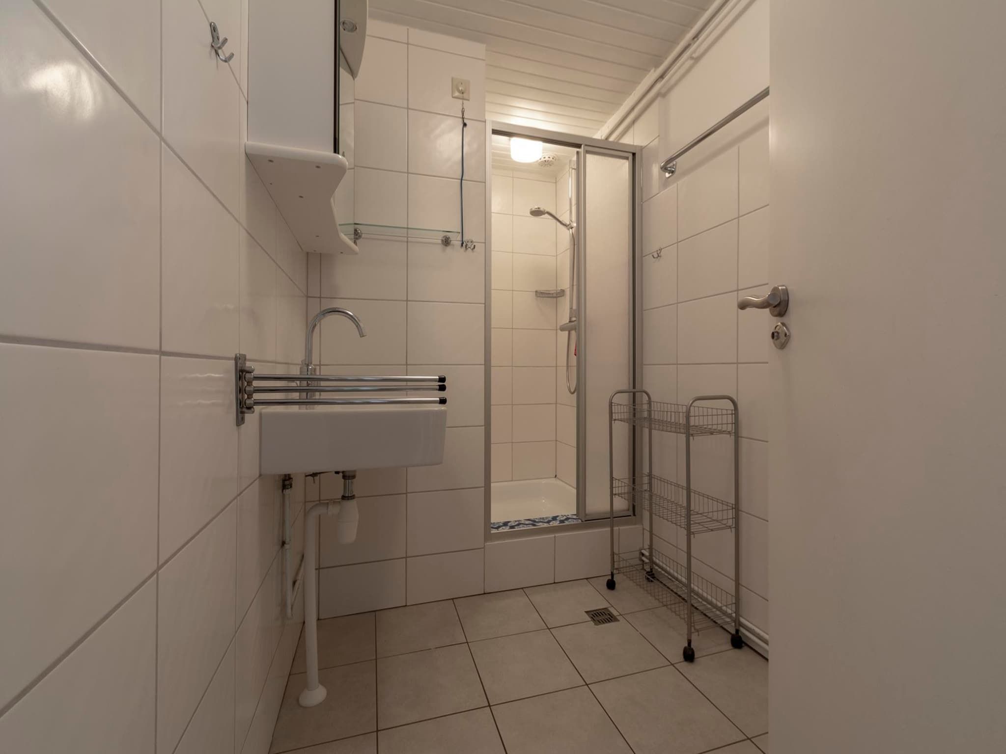 De badkamer van Duinland XL in Sint Maartenszee