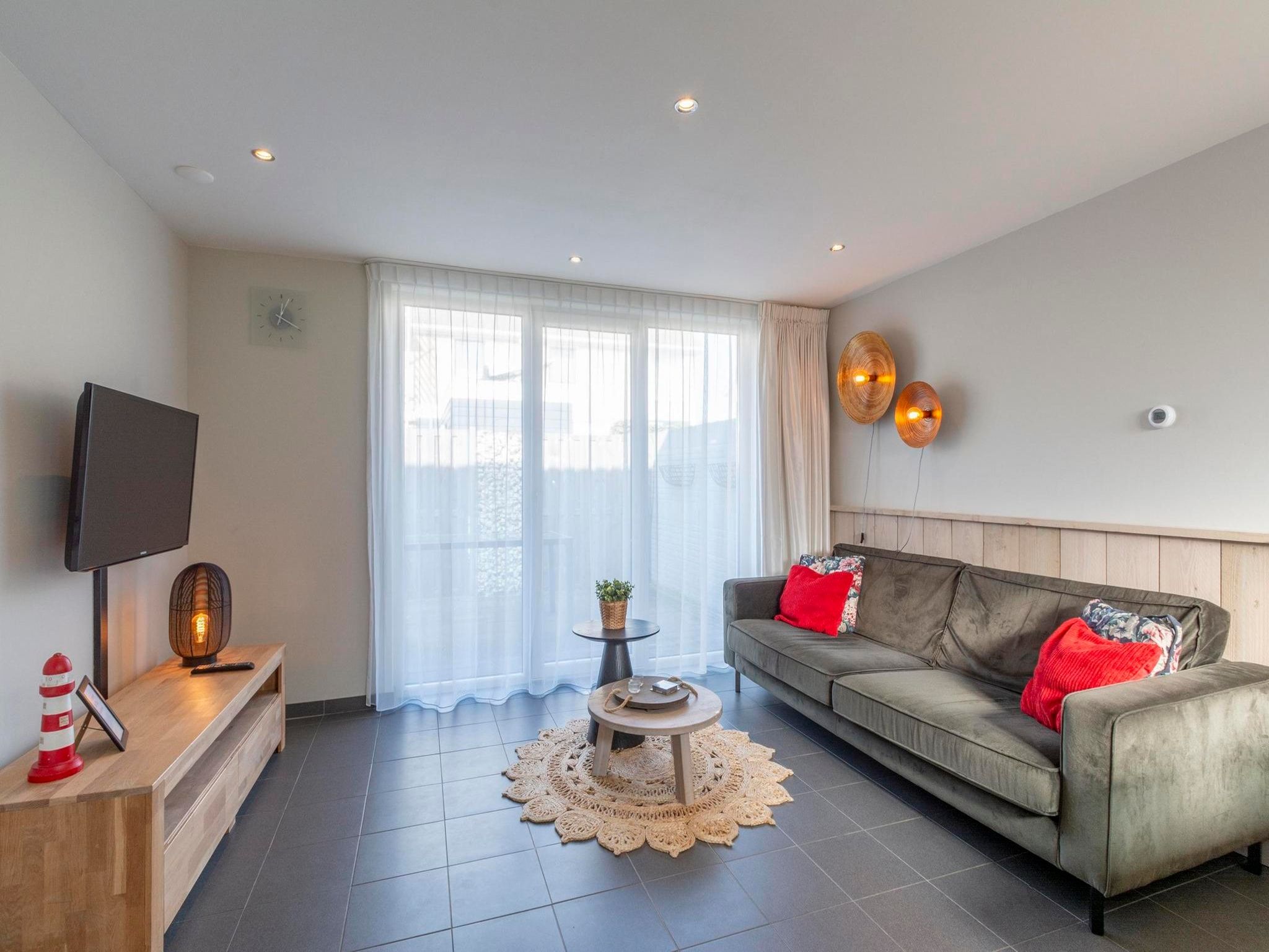 De woonkamer van Duinroosweg 83 in Callantsoog