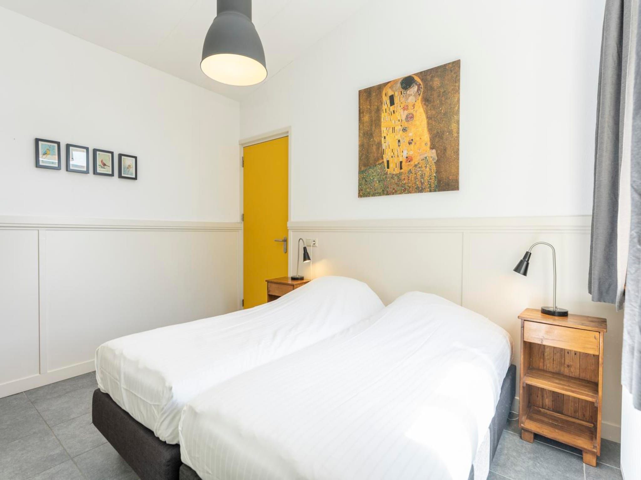 Een slaapkamer van Strandhuys Wulk in De Koog
