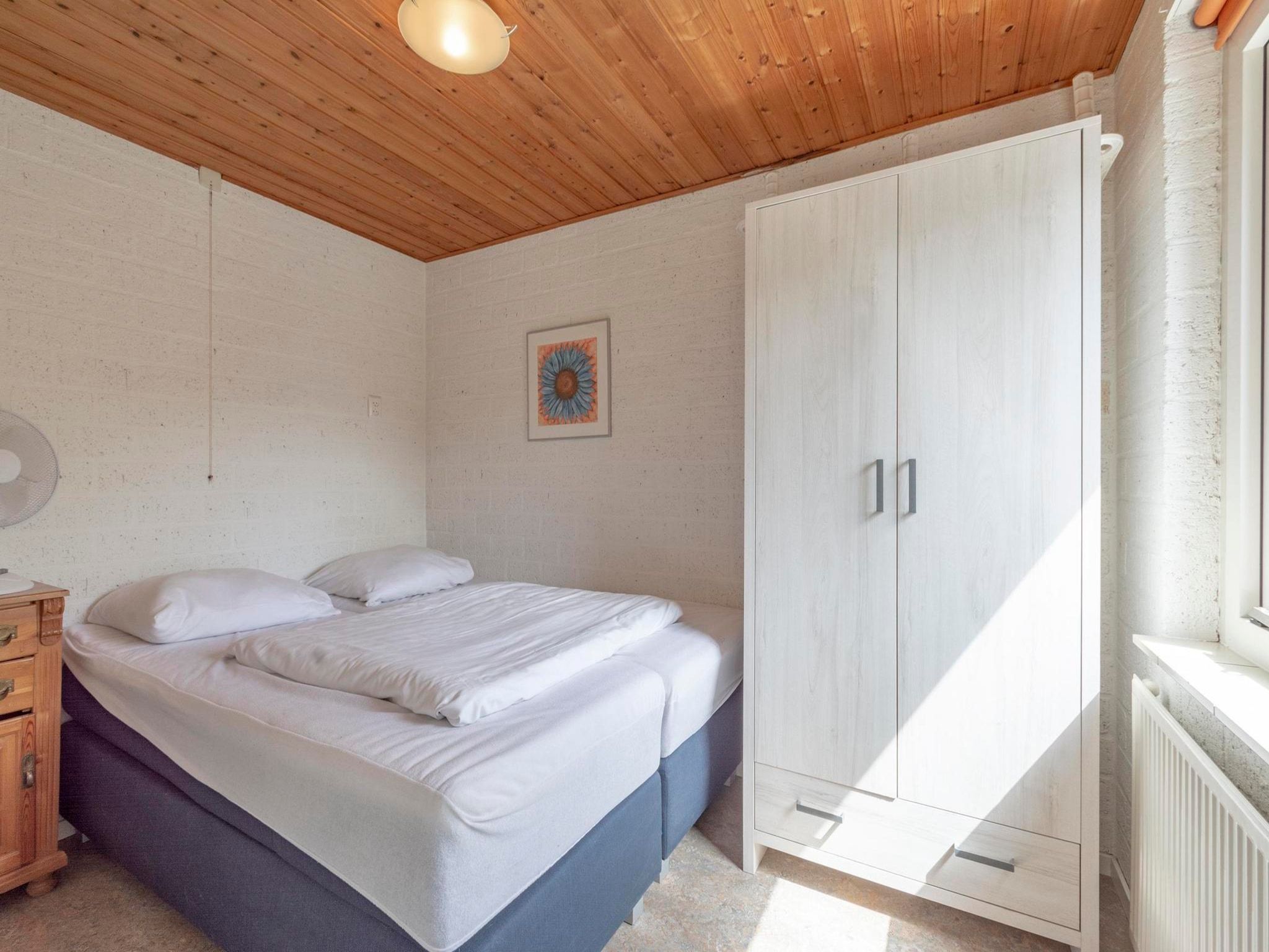 Een slaapkamer van De Blenck 49 in Callantsoog