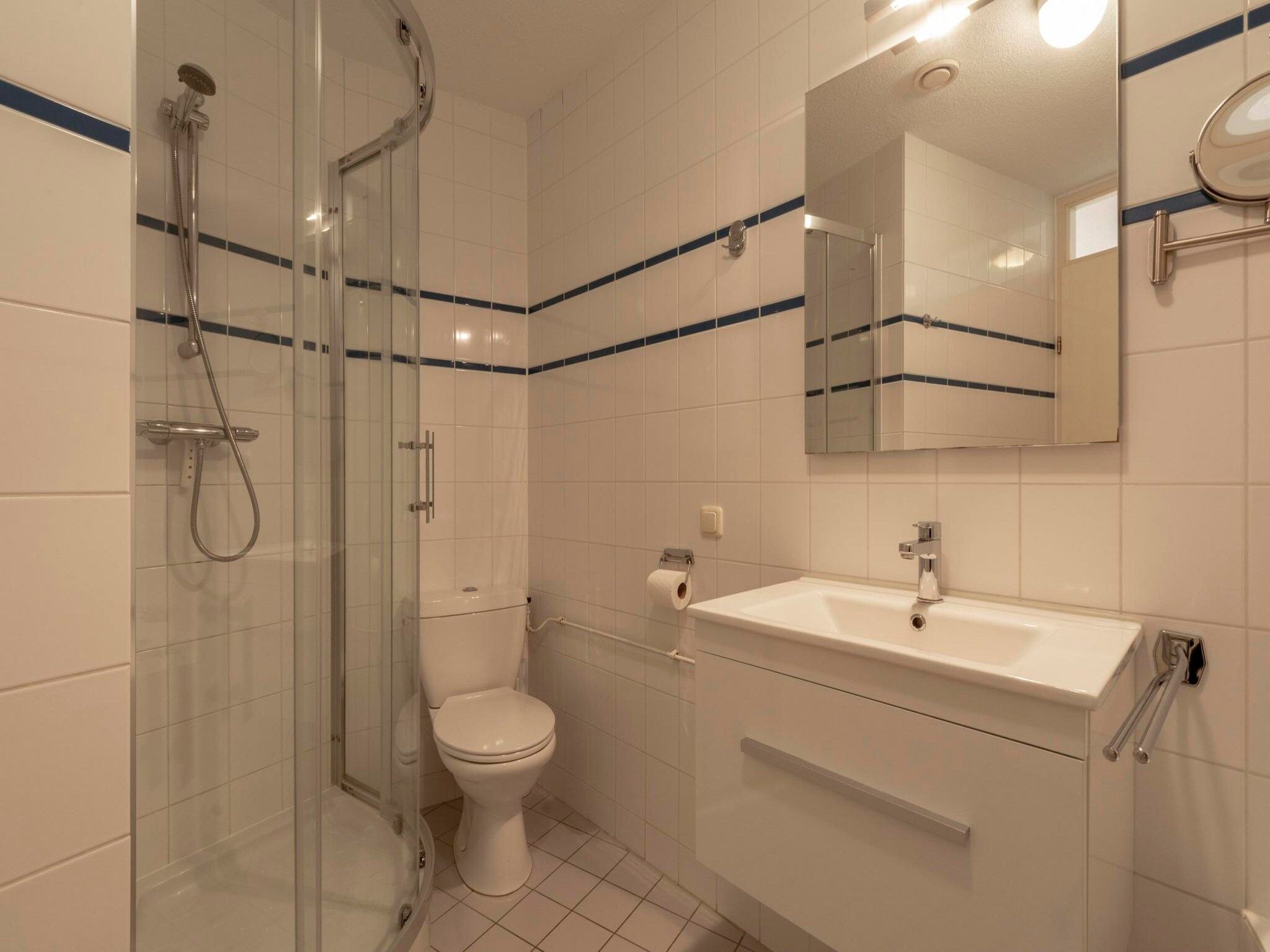 De badkamer van Résidence Juliana 77 in Julianadorp aan Zee