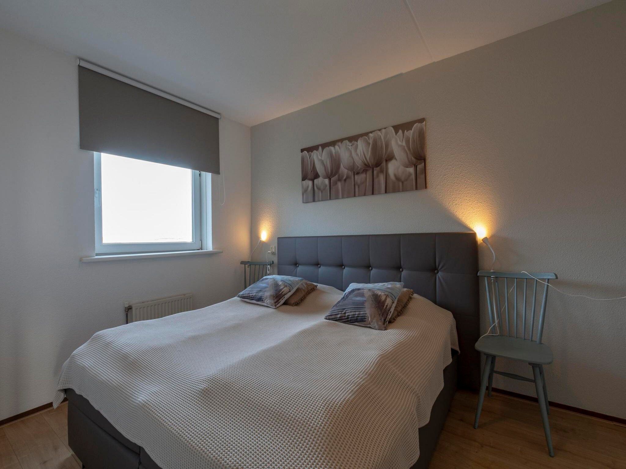 Een slaapkamer van Résidence Juliana 77 in Julianadorp aan Zee
