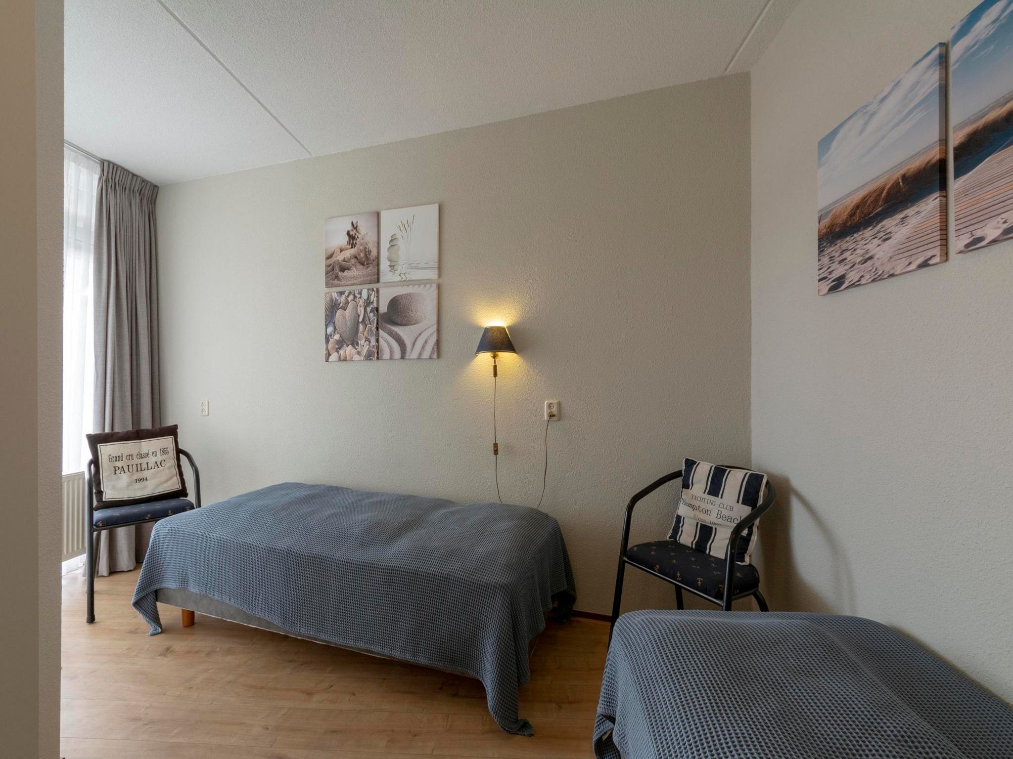 Een slaapkamer van Résidence Juliana 77 in Julianadorp aan Zee