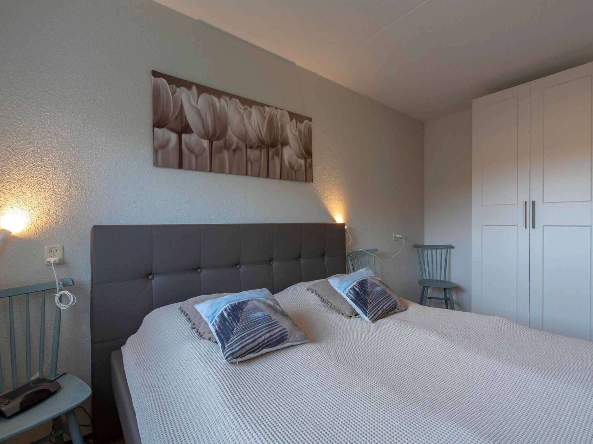 Een slaapkamer van Résidence Juliana 77 in Julianadorp aan Zee