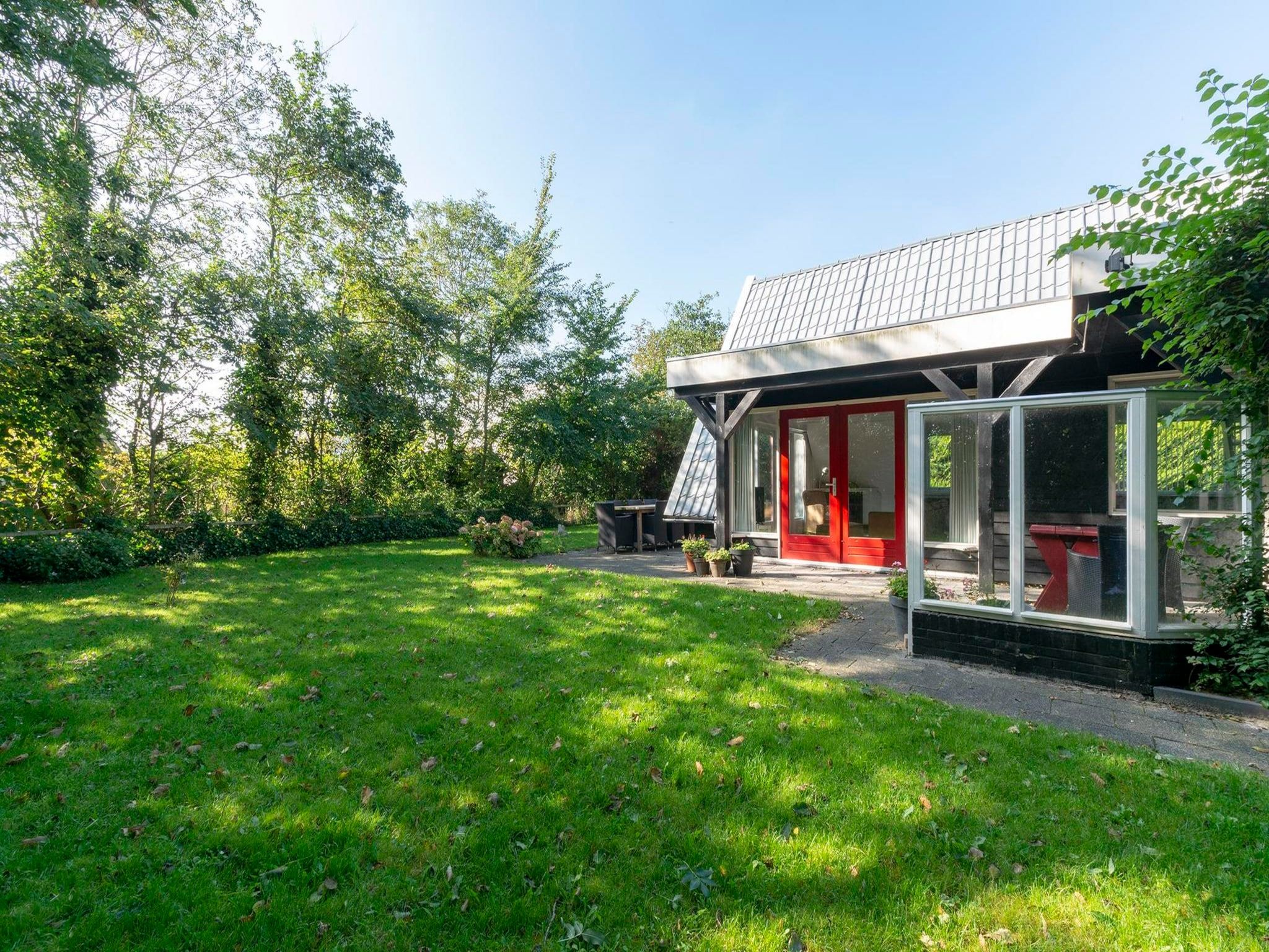 De tuin van Sandepark 151 Villa Matisse in Callantsoog