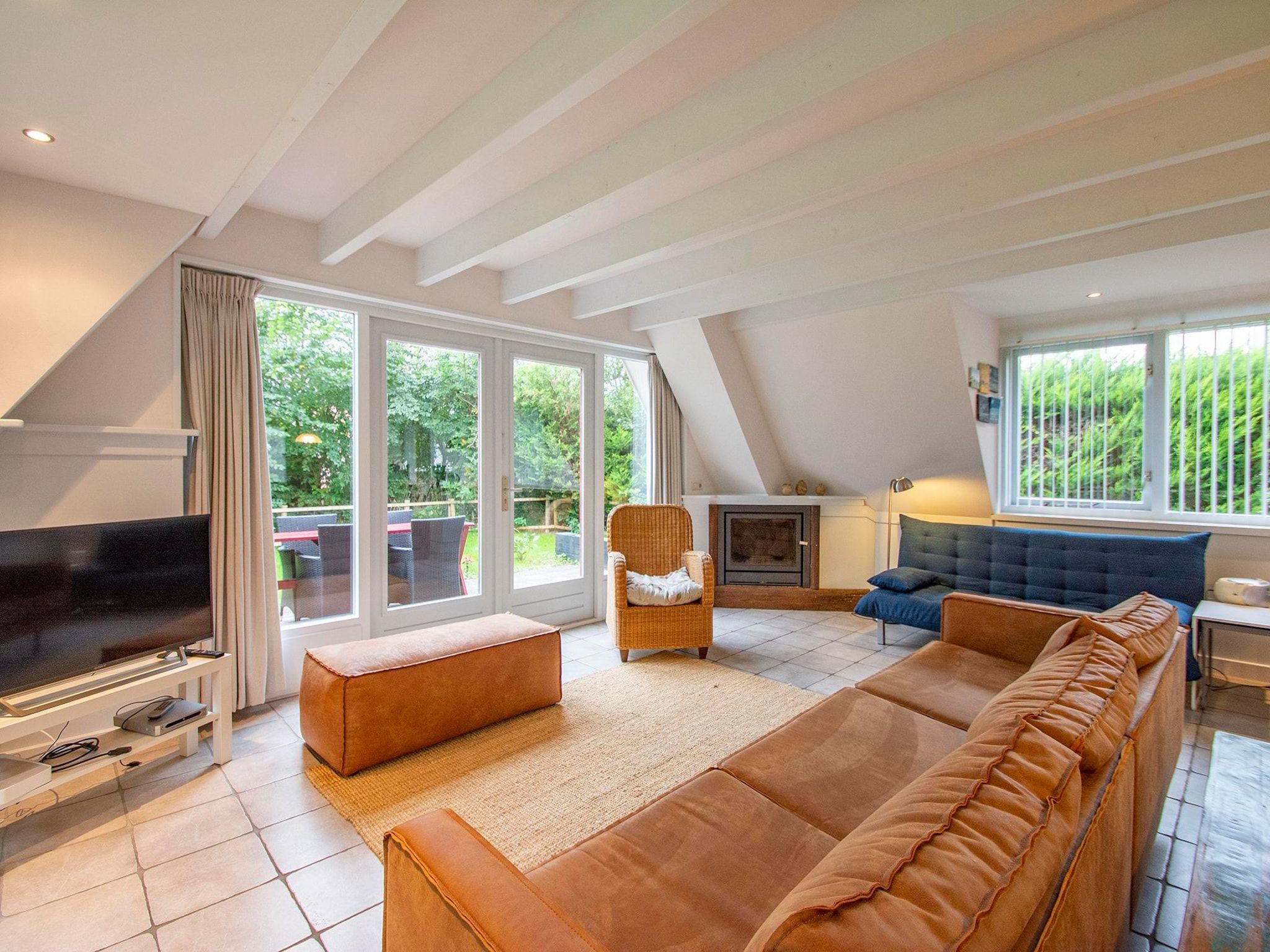 De woonkamer van Sandepark 151 Villa Matisse in Callantsoog