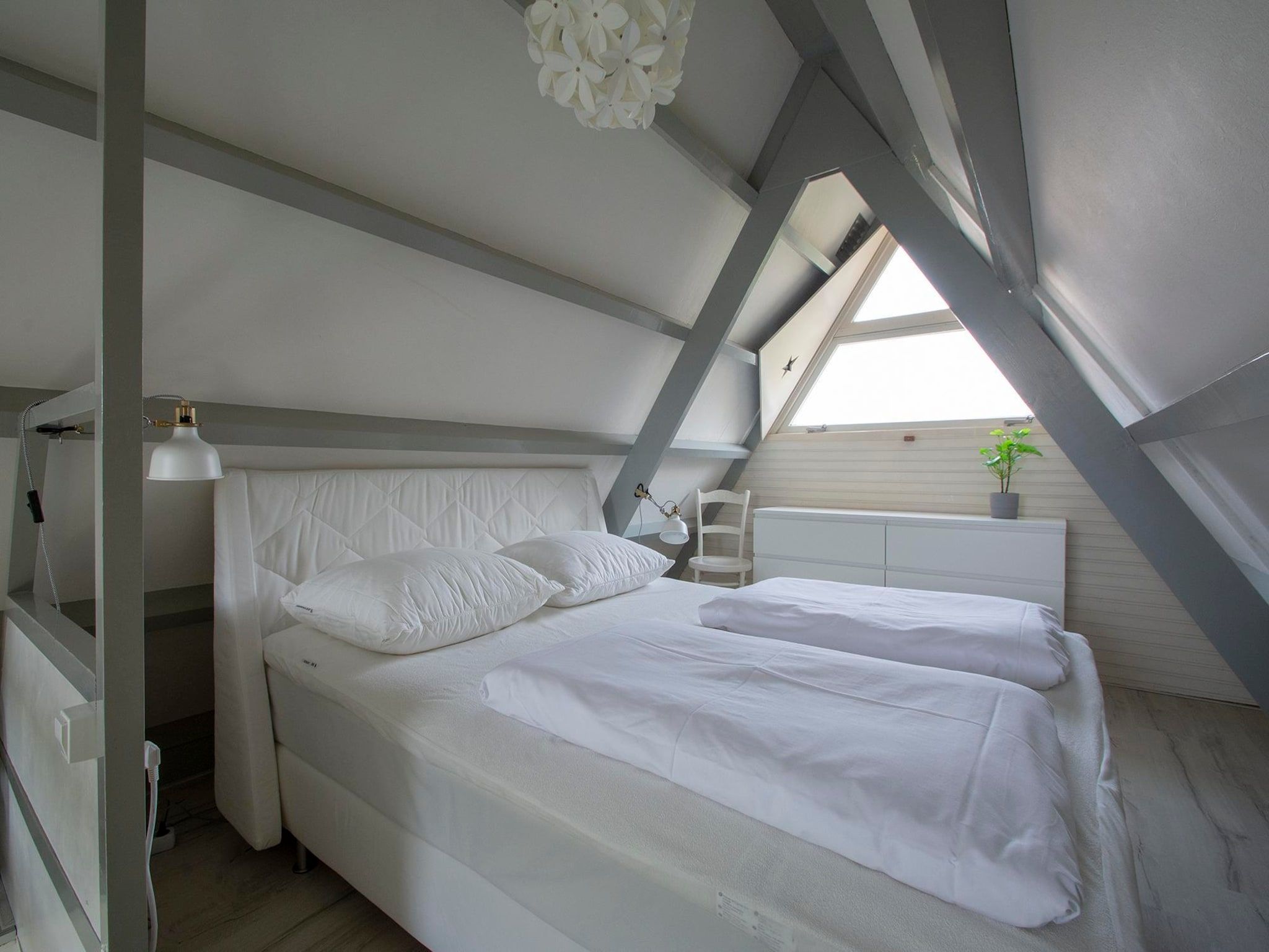 Een slaapkamer van Sandepark 165 in Groote Keeten