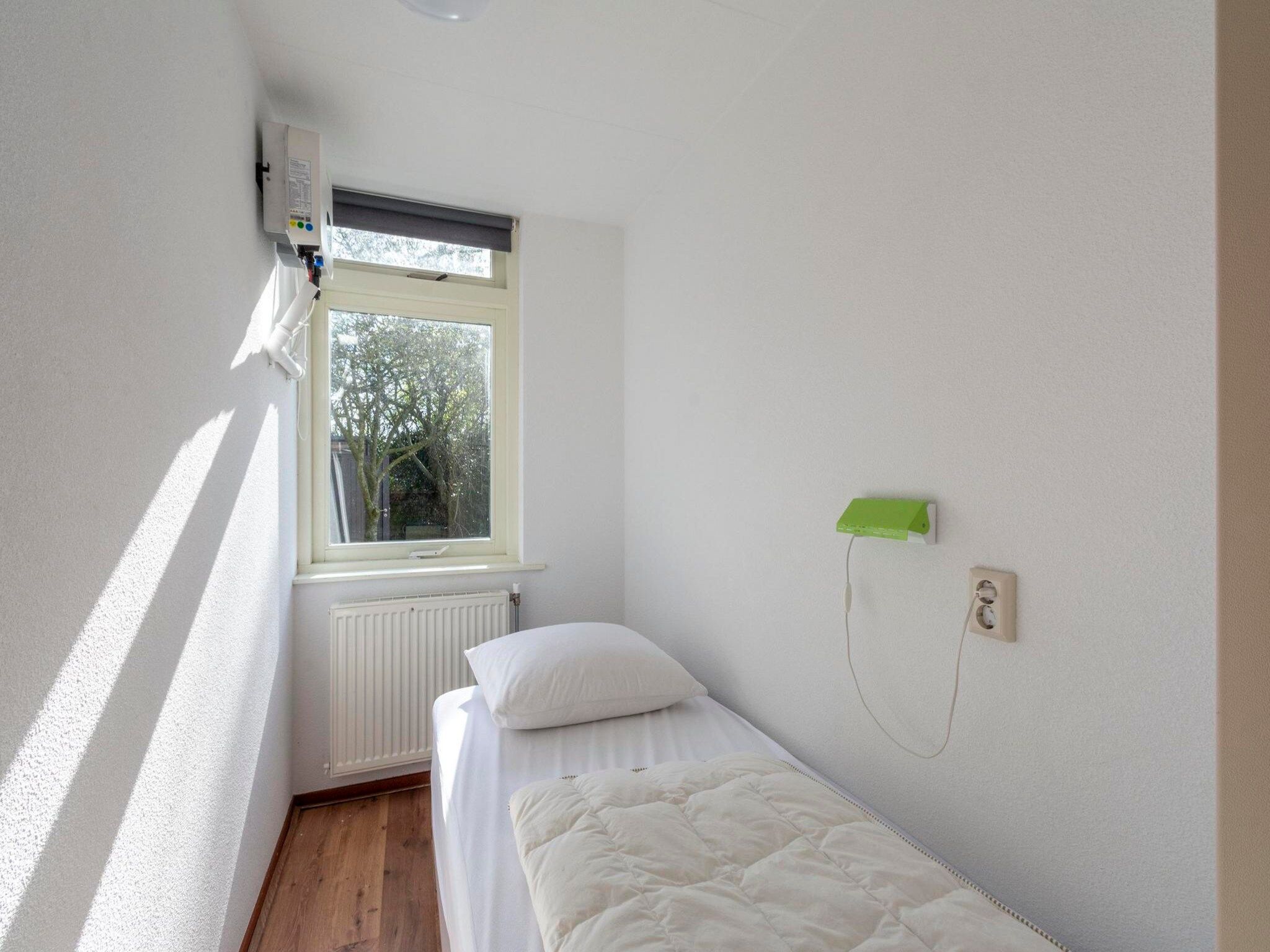 Een slaapkamer van Eureka 83 in Sint Maartenszee