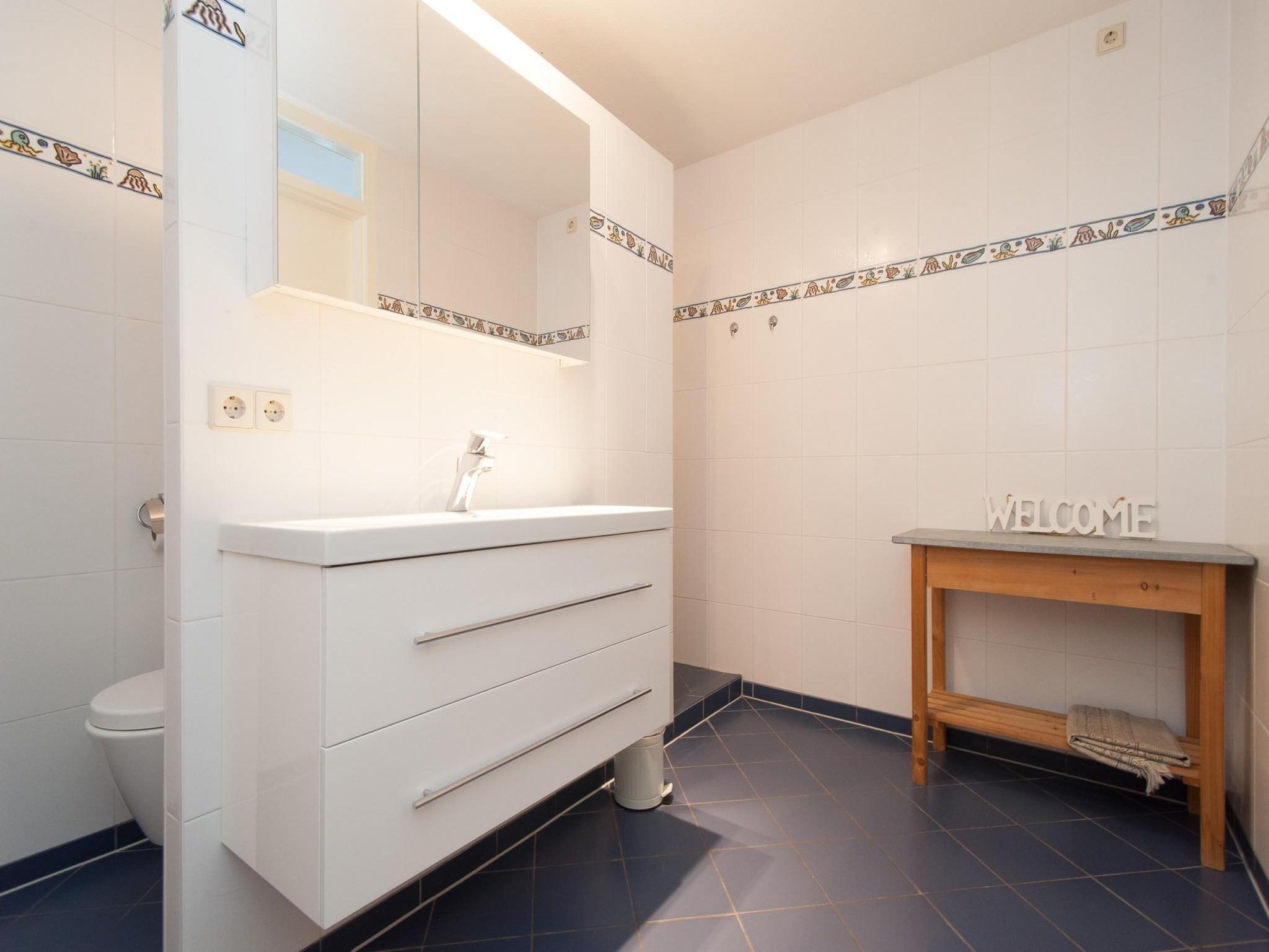 De badkamer van Suite Duinzicht in Callantsoog