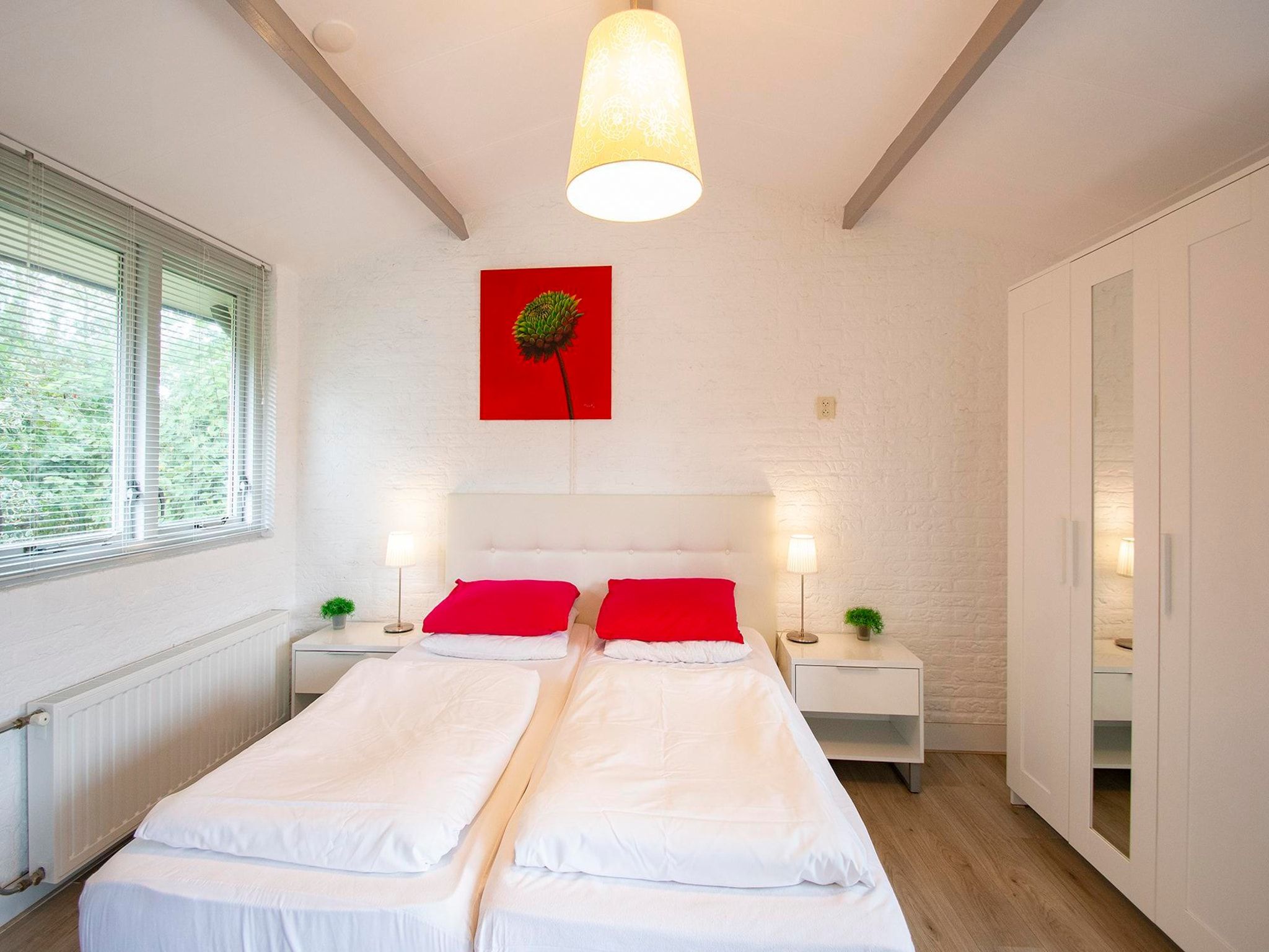 Een slaapkamer van Garnekuul 26 in Callantsoog