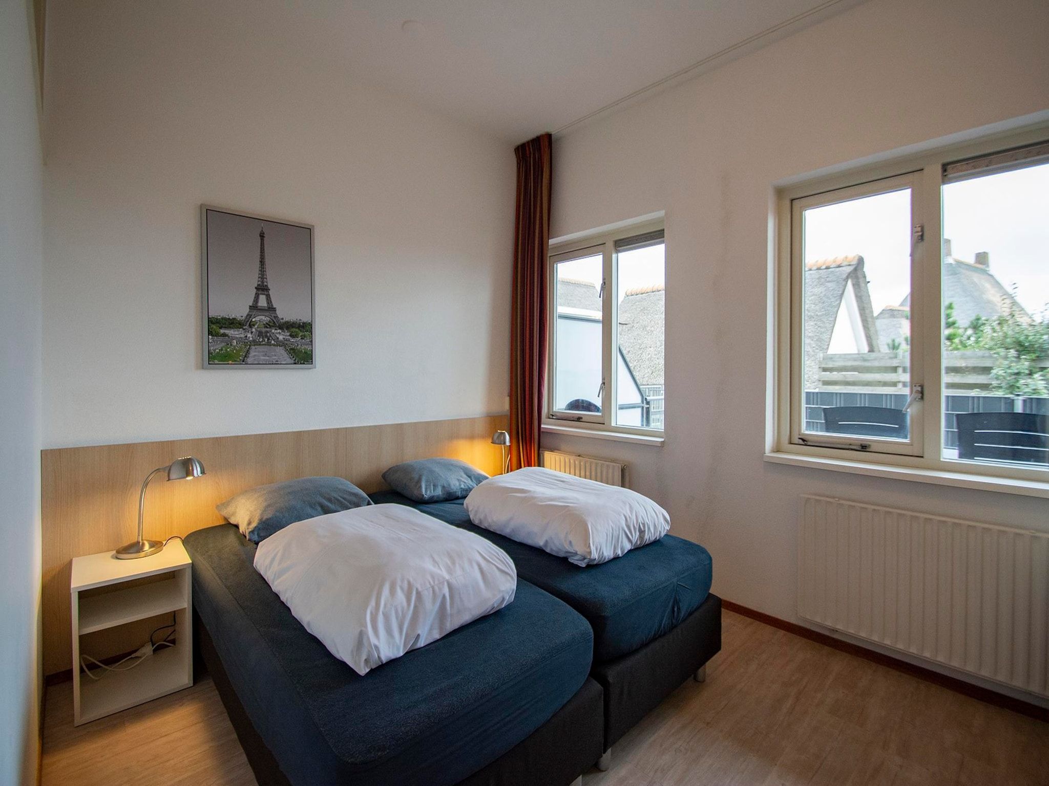 Een slaapkamer van Wijde Blick 103 in Callantsoog