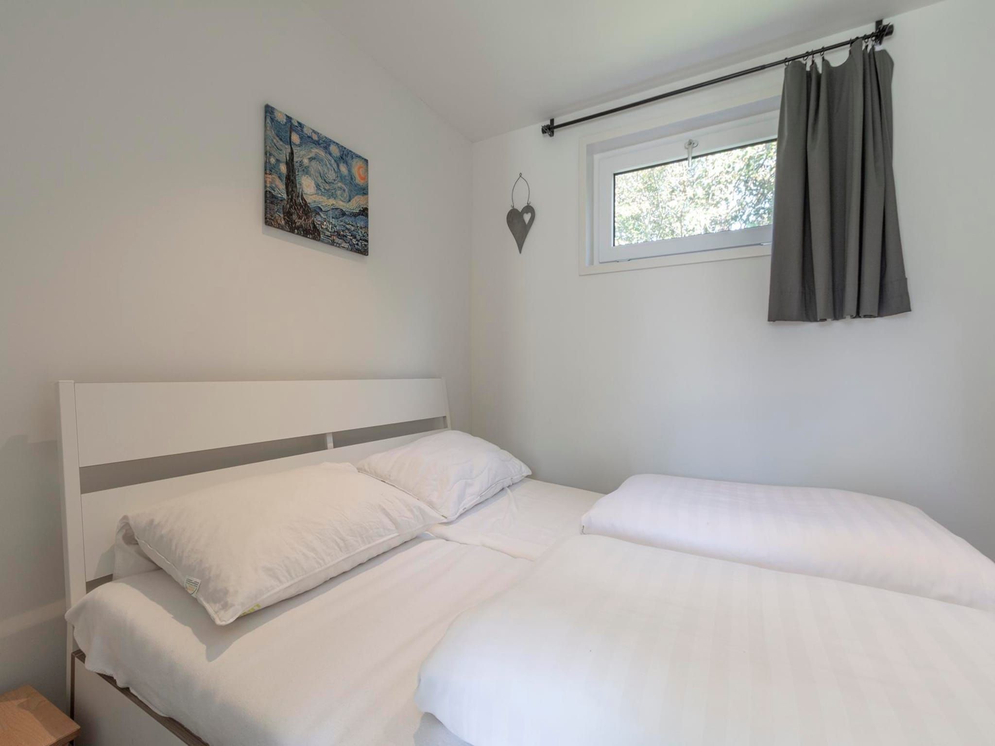 Een slaapkamer van Garnekuul 76 in Callantsoog